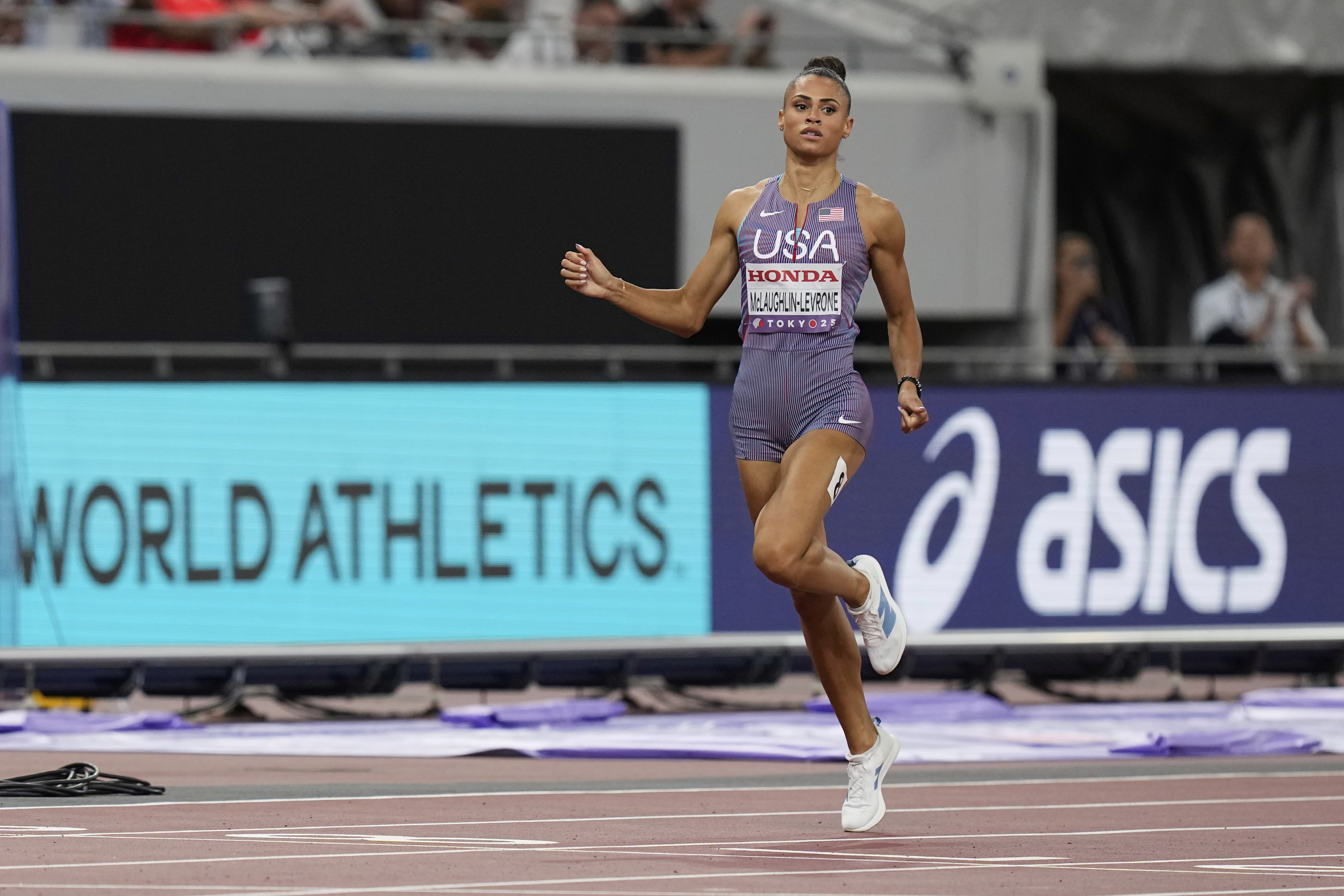 United States' Sydney McLaughlin-Levrone competes in the women's 400 meters semifinal at the World Athletics Championships in Tokyo, Tuesday, Sept. 16, 2025. 