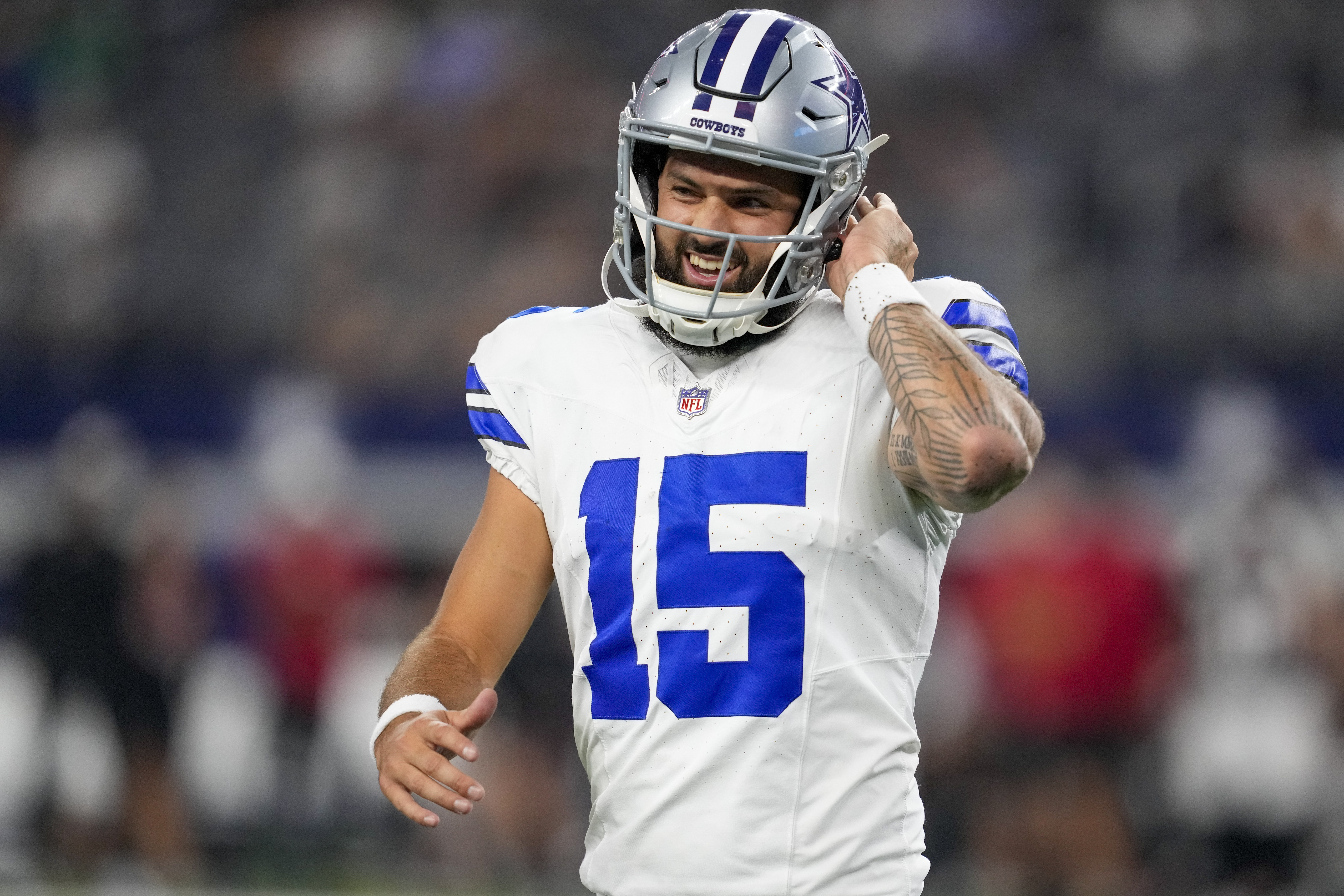 FILE - Dallas Cowboys quarterback Will Grier reacts after a play against the Atlanta Falcons during the second half of a preseason NFL football game Aug. 22, 2025, in Arlington, Texas. 