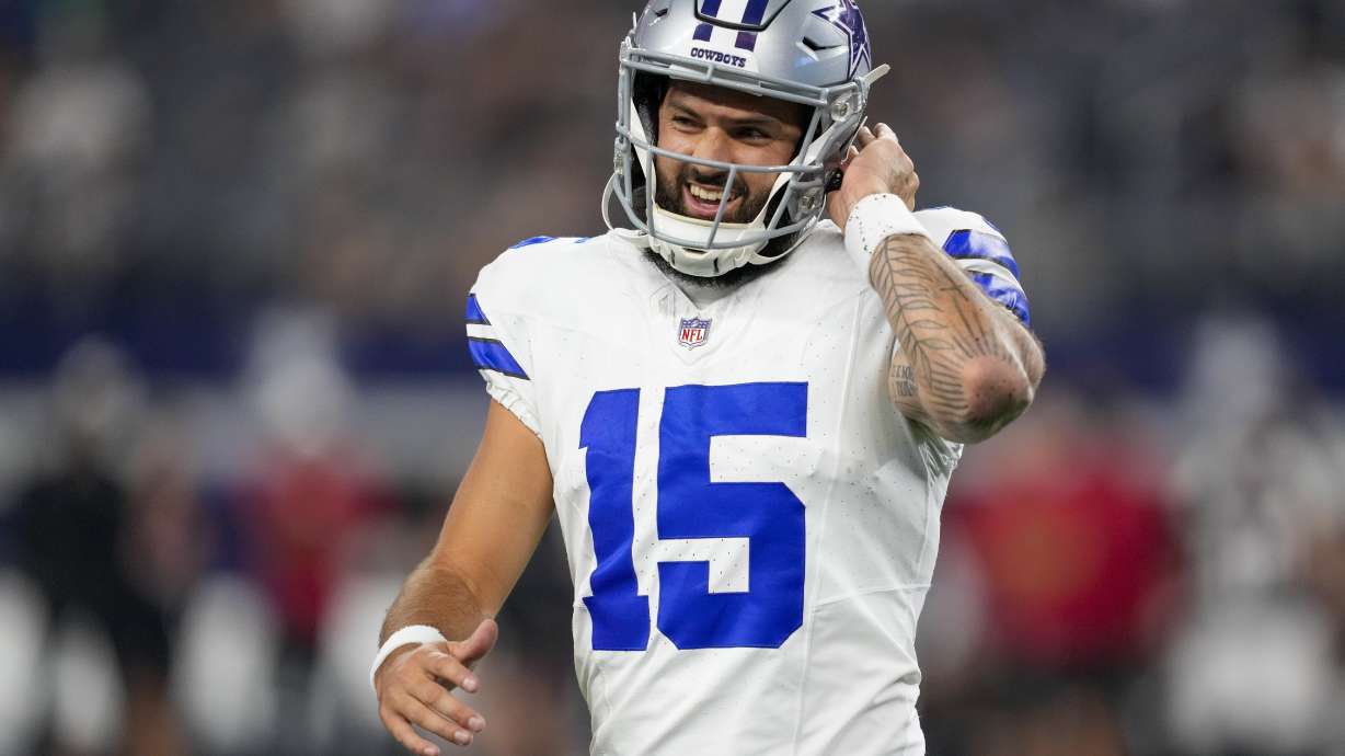 FILE - Dallas Cowboys quarterback Will Grier reacts after a play against the Atlanta Falcons during the second half of a preseason NFL football game Aug. 22, 2025, in Arlington, Texas.