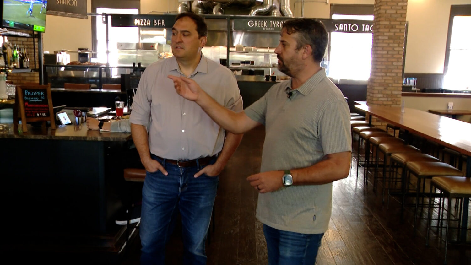 Sugar House Station owner Scott Evans shows KSL’s Matt Gephardt how restaurant QR code ordering has helped his establishment.
