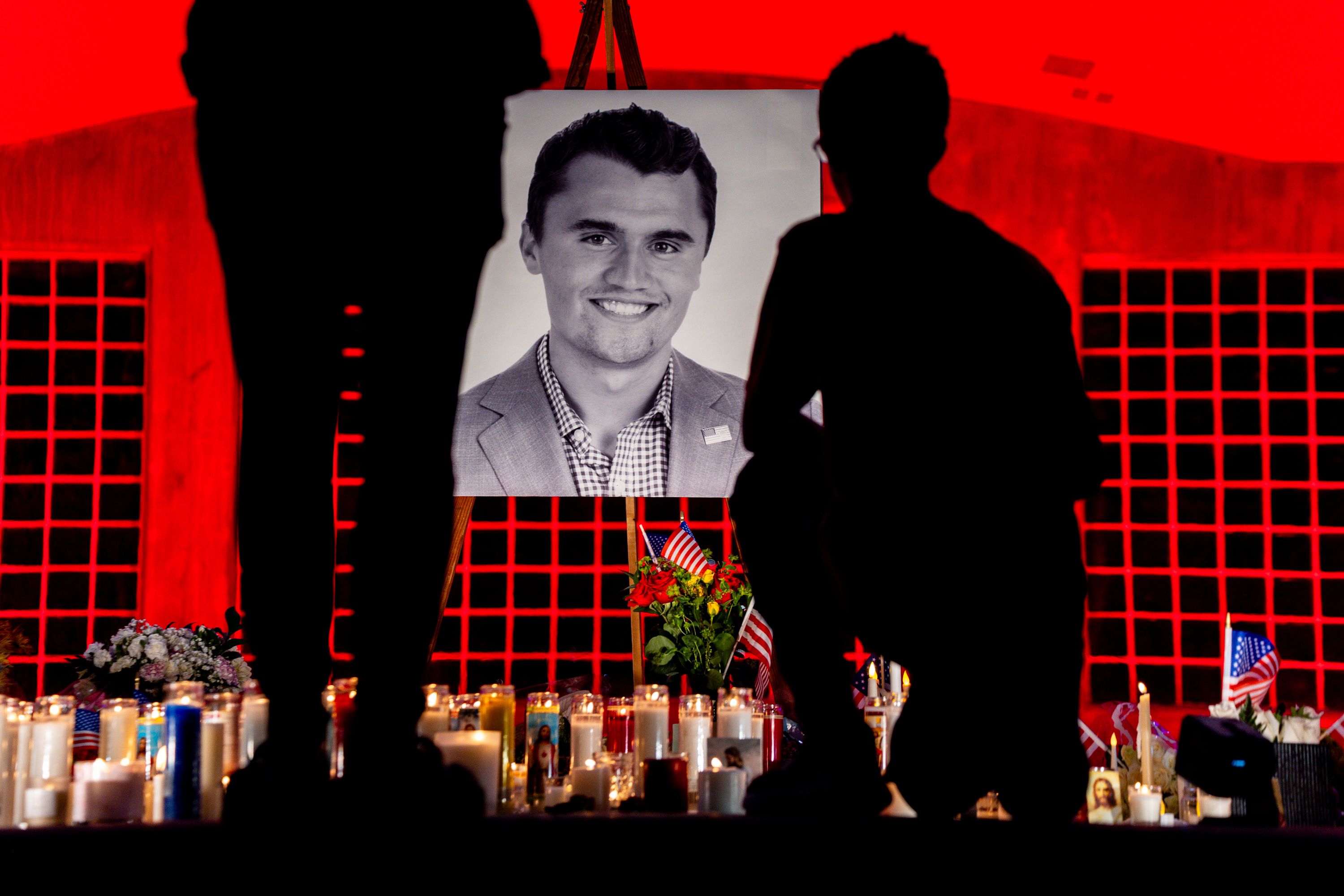 People grieve at a vigil for Charlie Kirk, the CEO and co-founder of the conservative youth organization Turning Point USA who was fatally shot during Turning Point’s visit to Utah Valley University in Orem on Sept. 10, at City Center Park in Orem on Sept. 11.