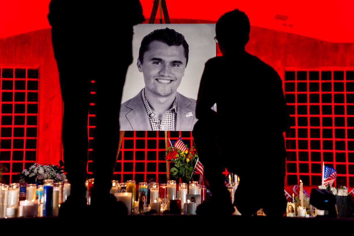People grieve at a vigil for Charlie Kirk, the CEO and co-founder of the conservative youth organization Turning Point USA who was fatally shot during Turning Point’s visit to Utah Valley University in Orem on Sept. 10, at City Center Park in Orem on Sept. 11.
