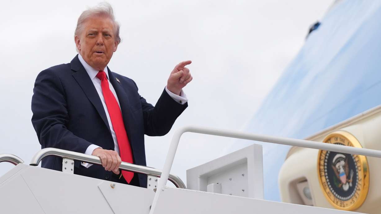 President Donald Trump boards Air Force One, Tuesday, in Joint Base Andrews, Md. Trump weighed in on the charges for the suspect accused of killing conservative activist Charlie Kirk last week in Utah.