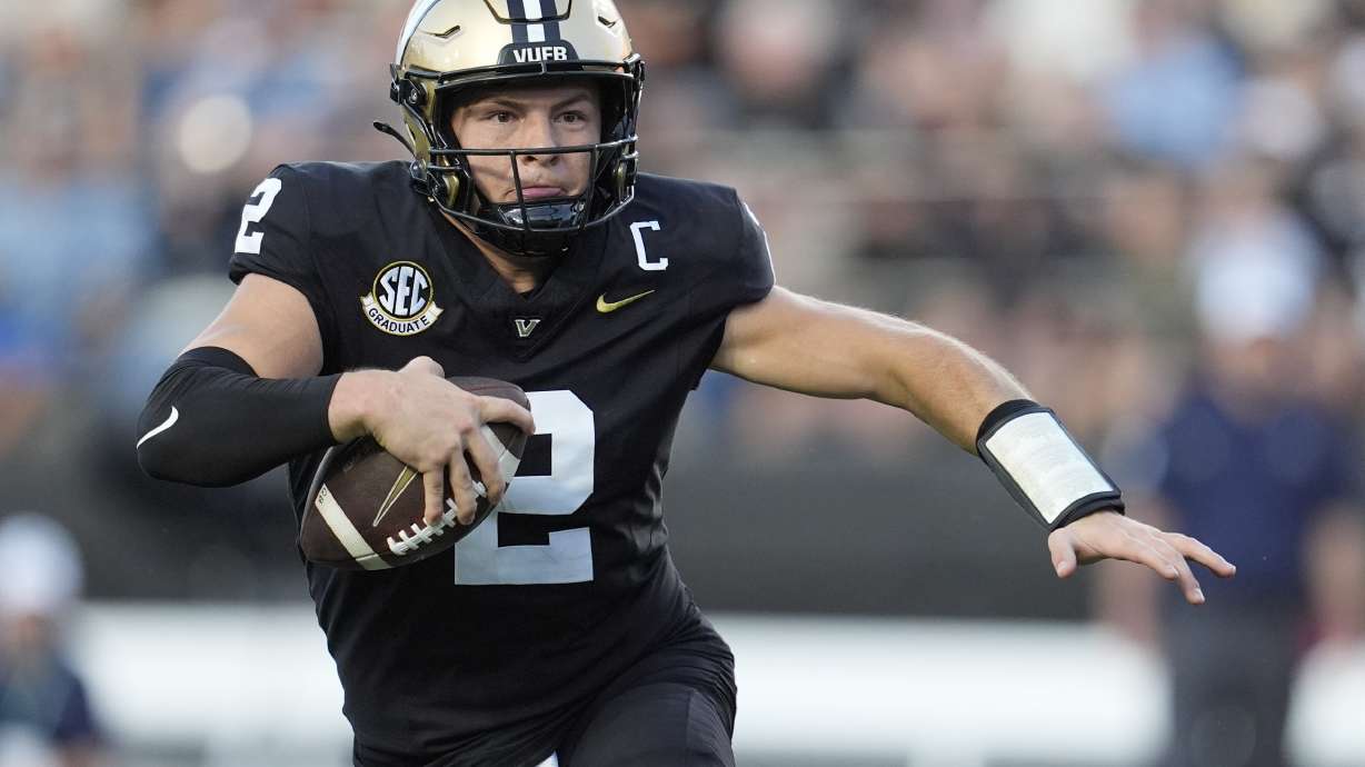 Vanderbilt quarterback Diego Pavia (2) runs the ball during the first half of an NCAA college football game against Charleston Southern, Saturday, Aug. 30, 2025, in Nashville, Tenn.