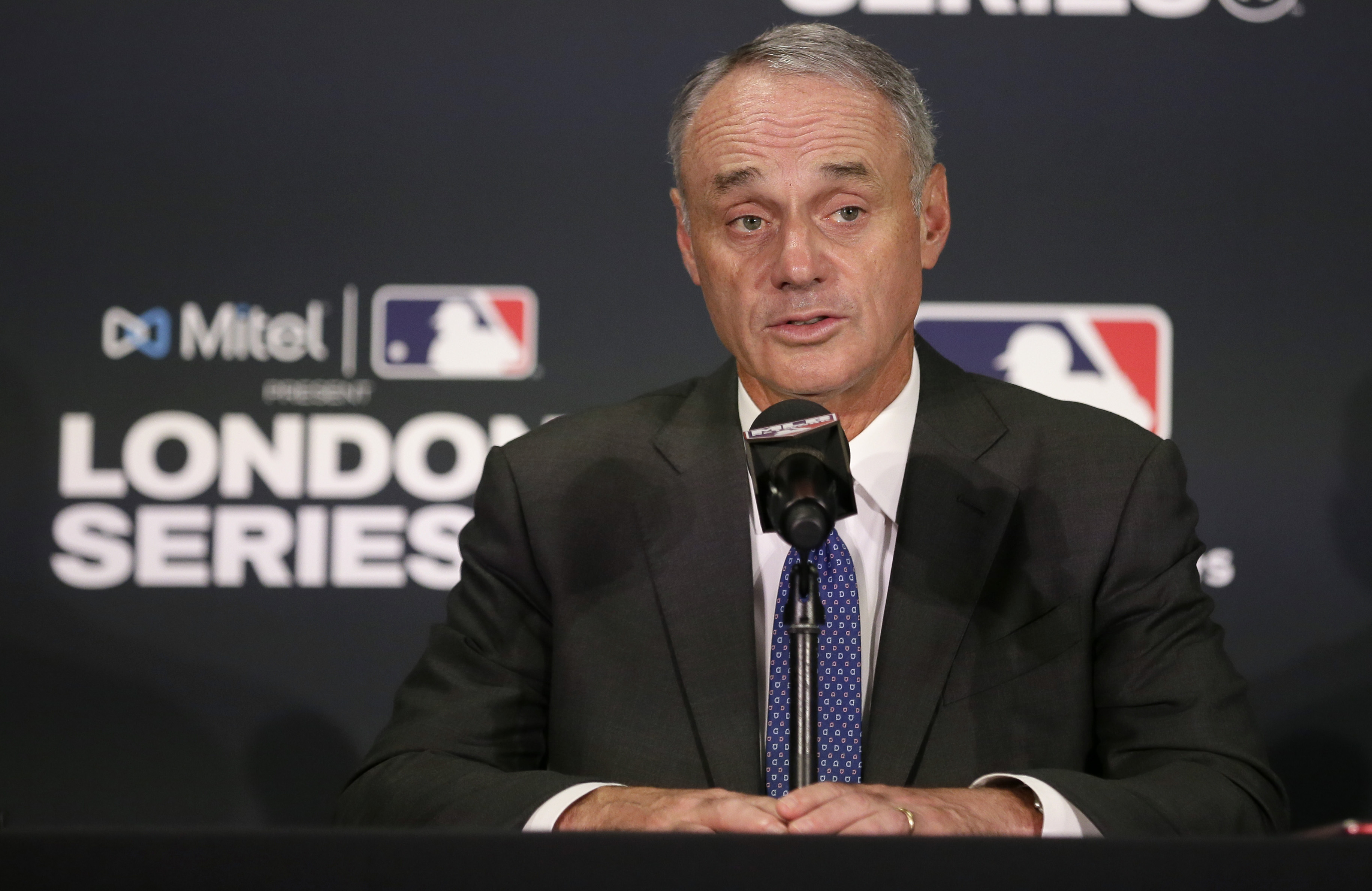 FILE - Major League Baseball commissioner Rob Manfred speaks during a news conference, June 29, 2019, in London. 