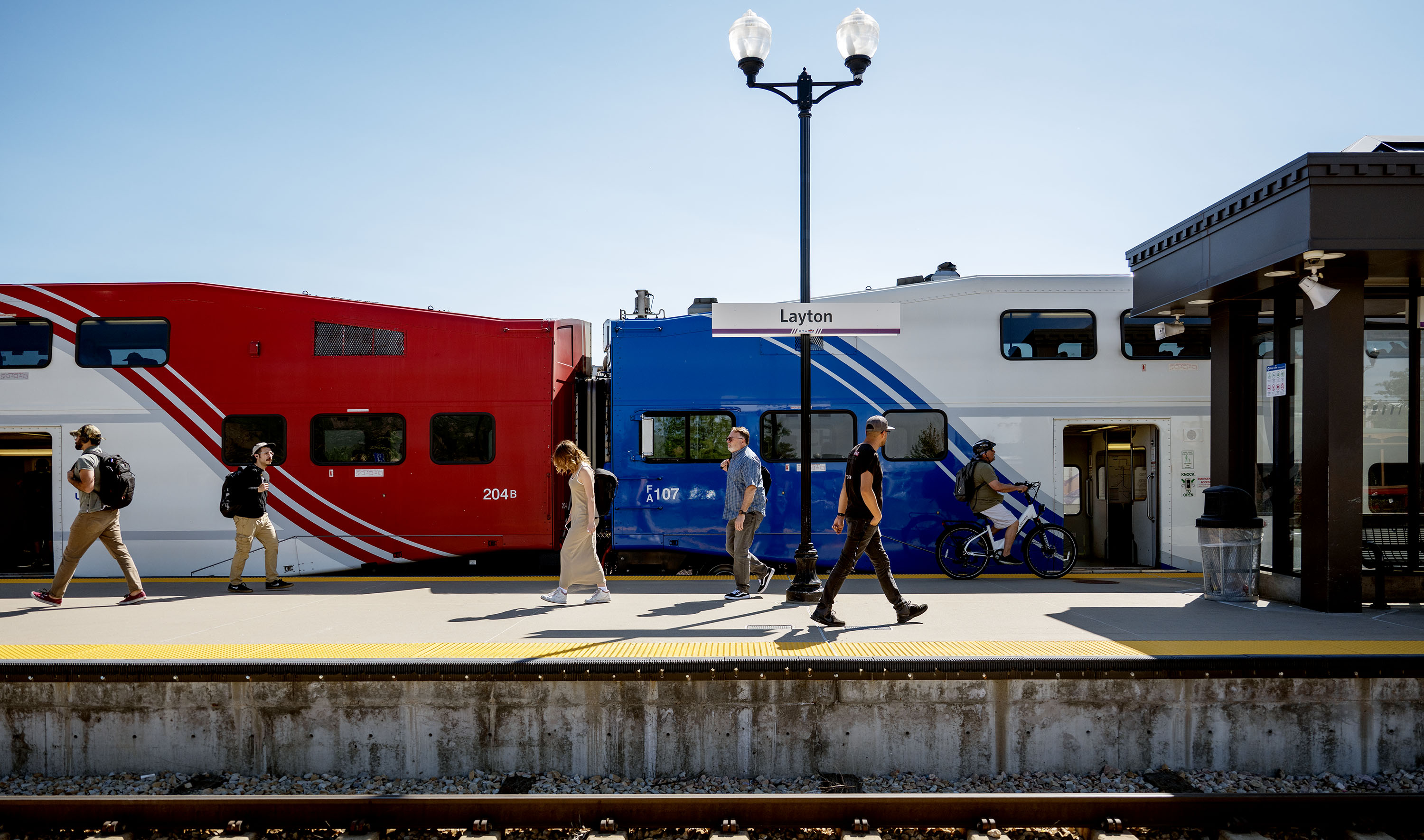 Passengers make their way on the FrontRunner platform at the Layton Station on June 3. UTA and UDOT are planning on adding double tracks to 11 areas along the FrontRunner system to increase ridership and train frequency.