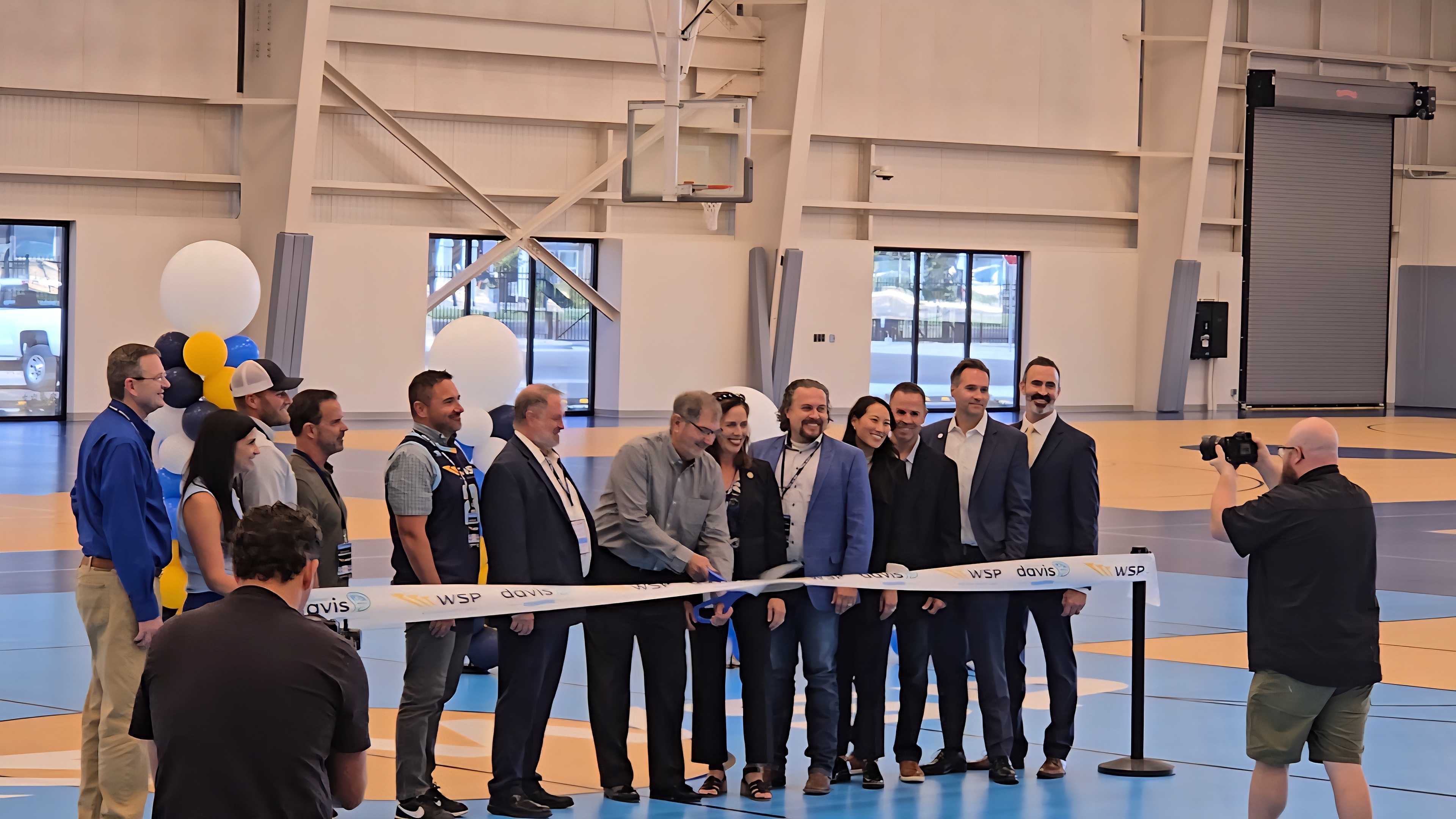Officials gather for the grand opening of the revitalized Legacy Events Center, now called the Western Sports Park, in Davis County.