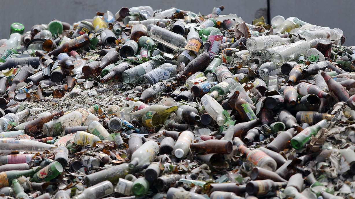 A pile of glass bottles is seen at Momentum Recycling in Salt Lake City on May 23, 2016. Utah recycling experts provided four potential ways to increase glass recycling in the state on Tuesday, which could spark future legislation.