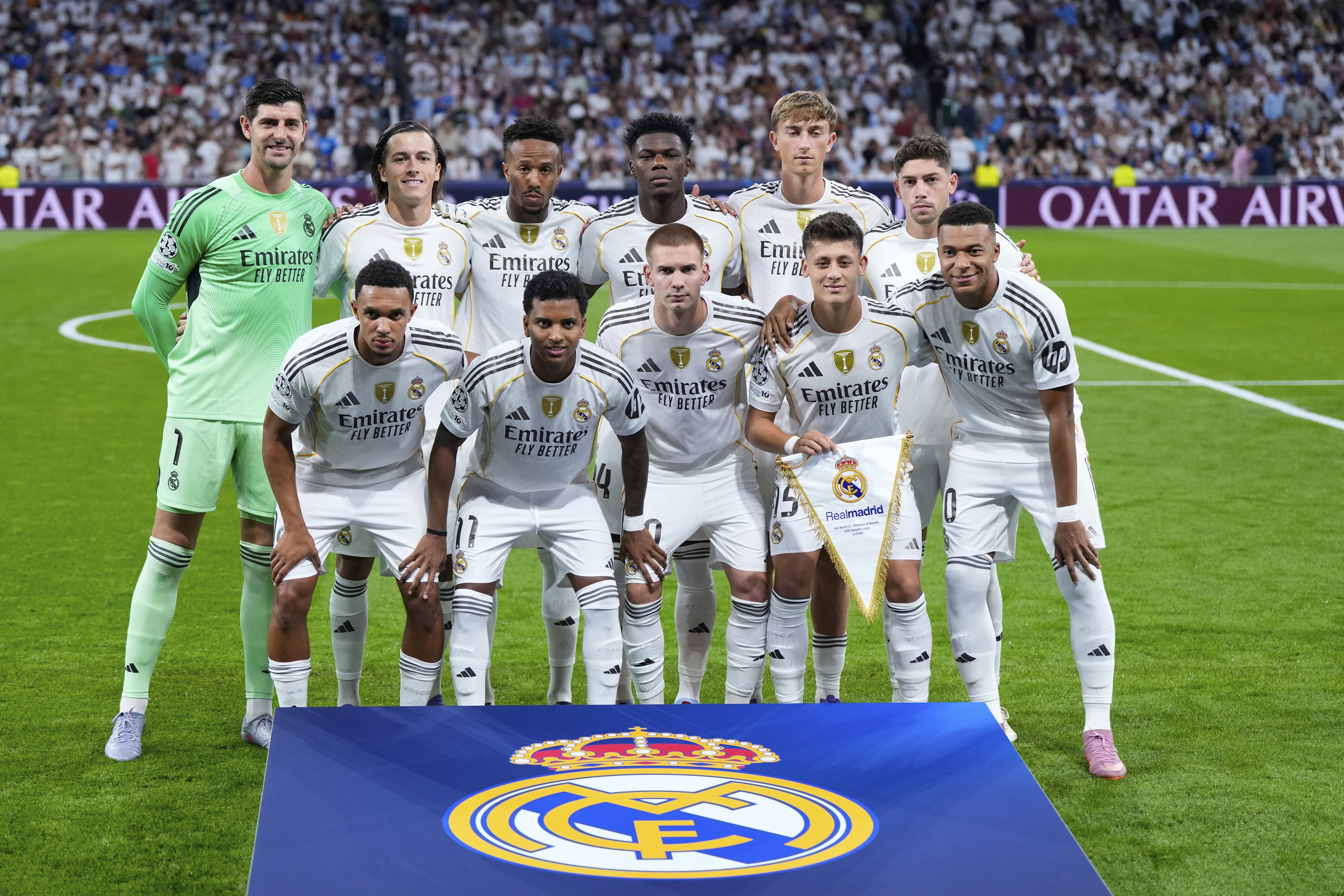 Real Madrid's players pose for photographers prior to a Champions League opening phase soccer match between Real Madrid and Marseille at Santiago Bernabeu stadium, in Madrid, Tuesday, Sept. 16, 2025. 