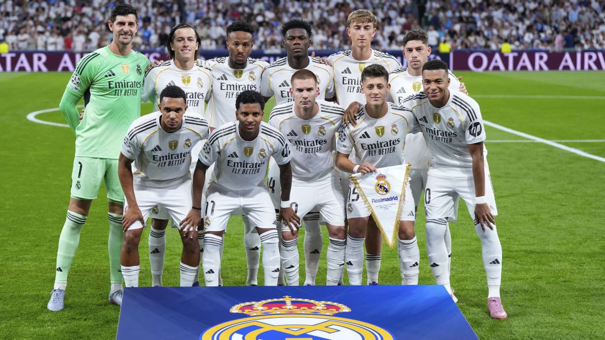 Real Madrid's players pose for photographers prior to a Champions League opening phase soccer match between Real Madrid and Marseille at Santiago Bernabeu stadium, in Madrid, Tuesday, Sept. 16, 2025.