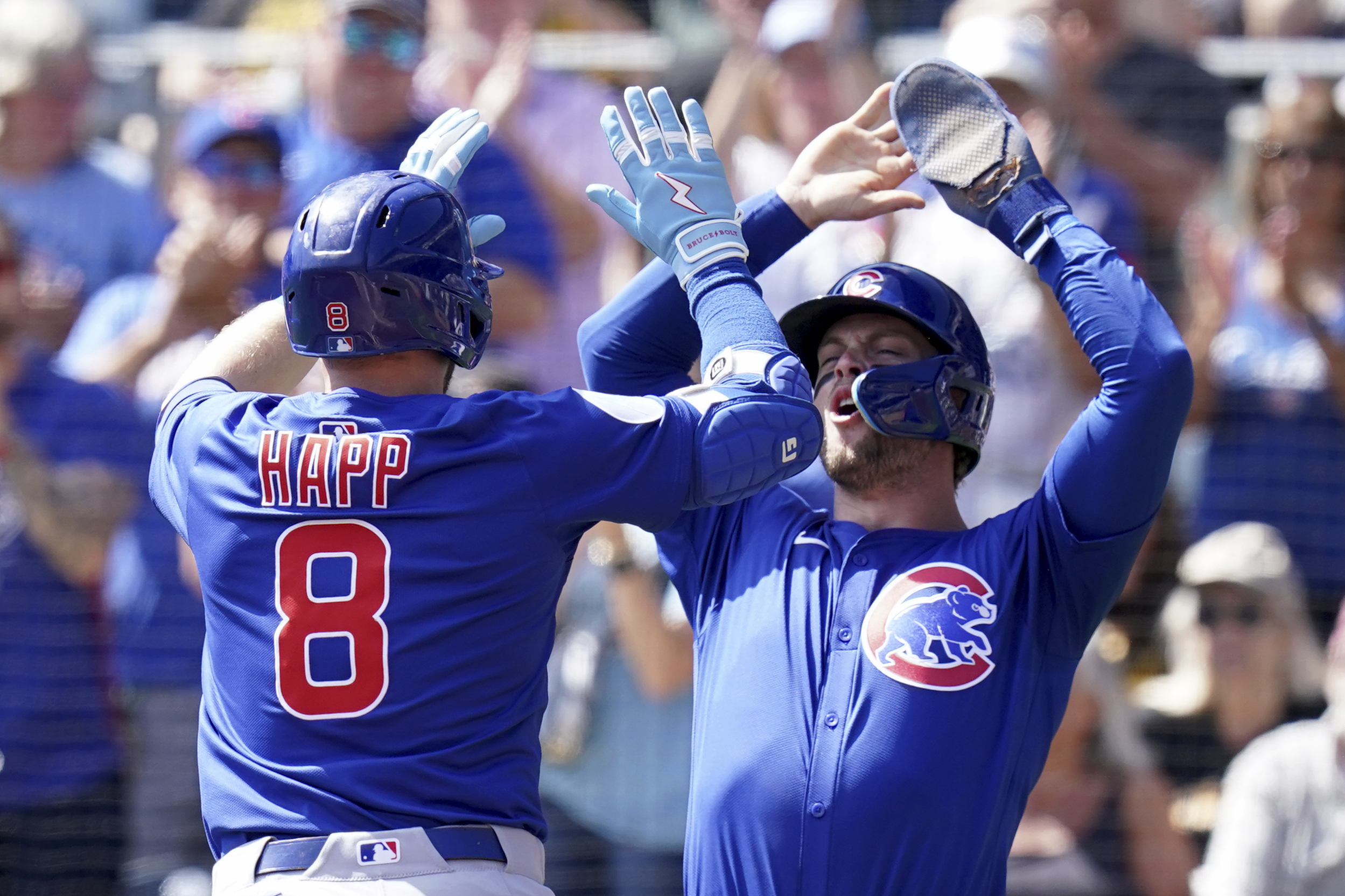 Happ homers as the Cubs clinch first postseason berth since 2020 with an 8-4 win over the Pirates