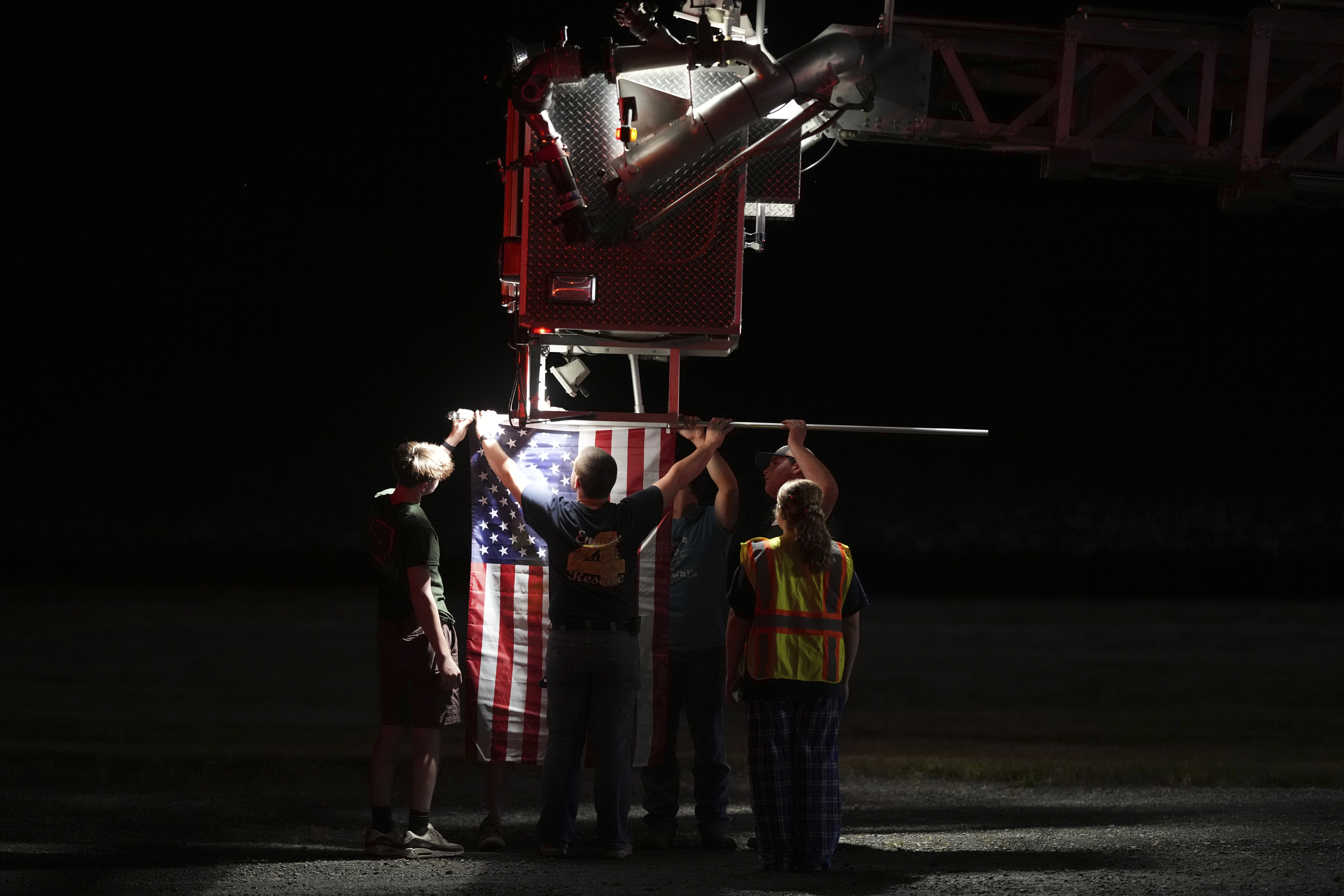 Officers killed by gunfire in rural Pennsylvania were hoping to arrest a suspected stalker