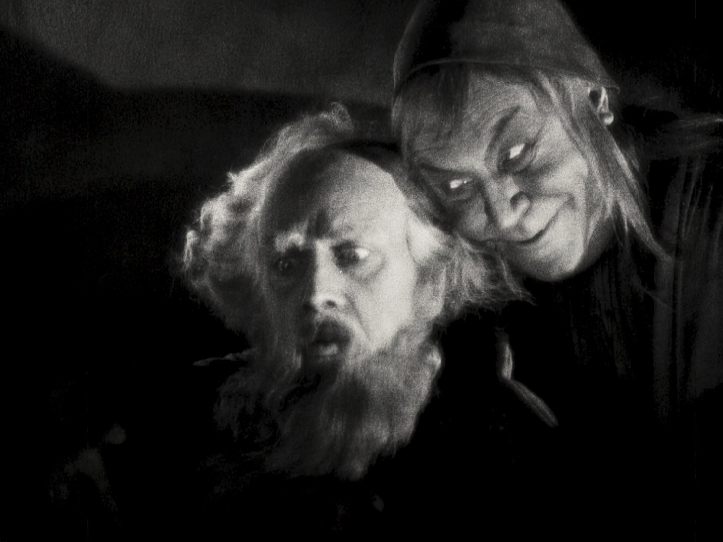 This image released by Kino Lorber shows Gösta Ekman, left, and Emil Jennings in a scene from the 1926 German film "Faust." 