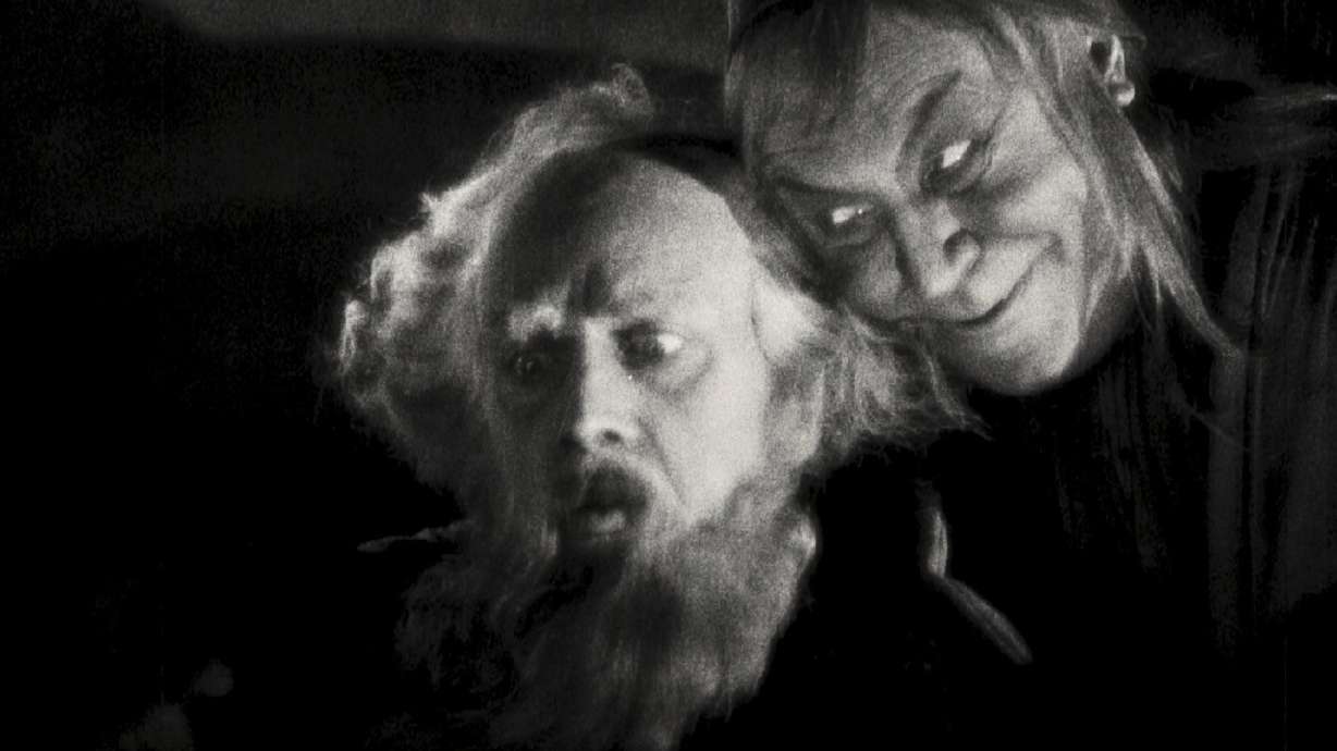 This image released by Kino Lorber shows Gösta Ekman, left, and Emil Jennings in a scene from the 1926 German film "Faust."