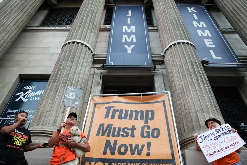 People demonstrate outside the El Capitan Entertainment Centre in Los Angeles, Wednesday. President Donald Trump on Thursday celebrated the suspension of Jimmy Kimmel as debate reigns over infringement on free speech.