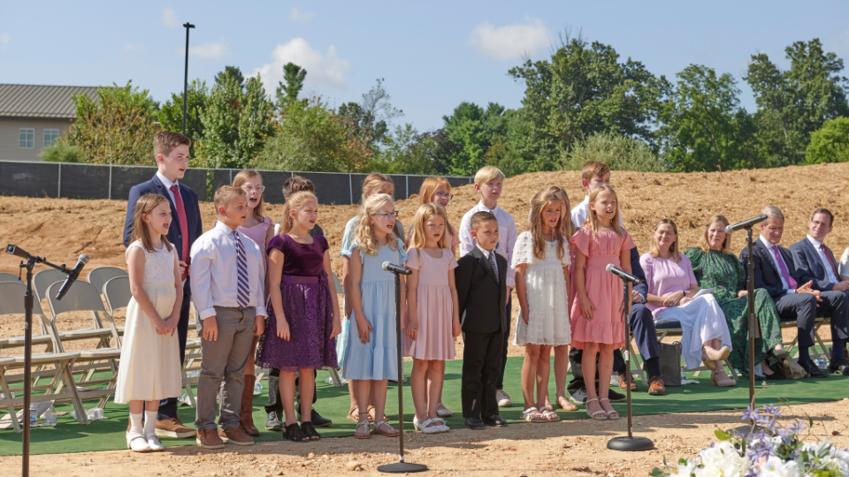 A children's choir from the Gainesville Virginia Stake sings “Our Prayer to Thee” at the groundbreaking of the Winchester Virginia Temple on Aug. 9. The hymn is in the church's latest batch of songs released for the new hymnbook.