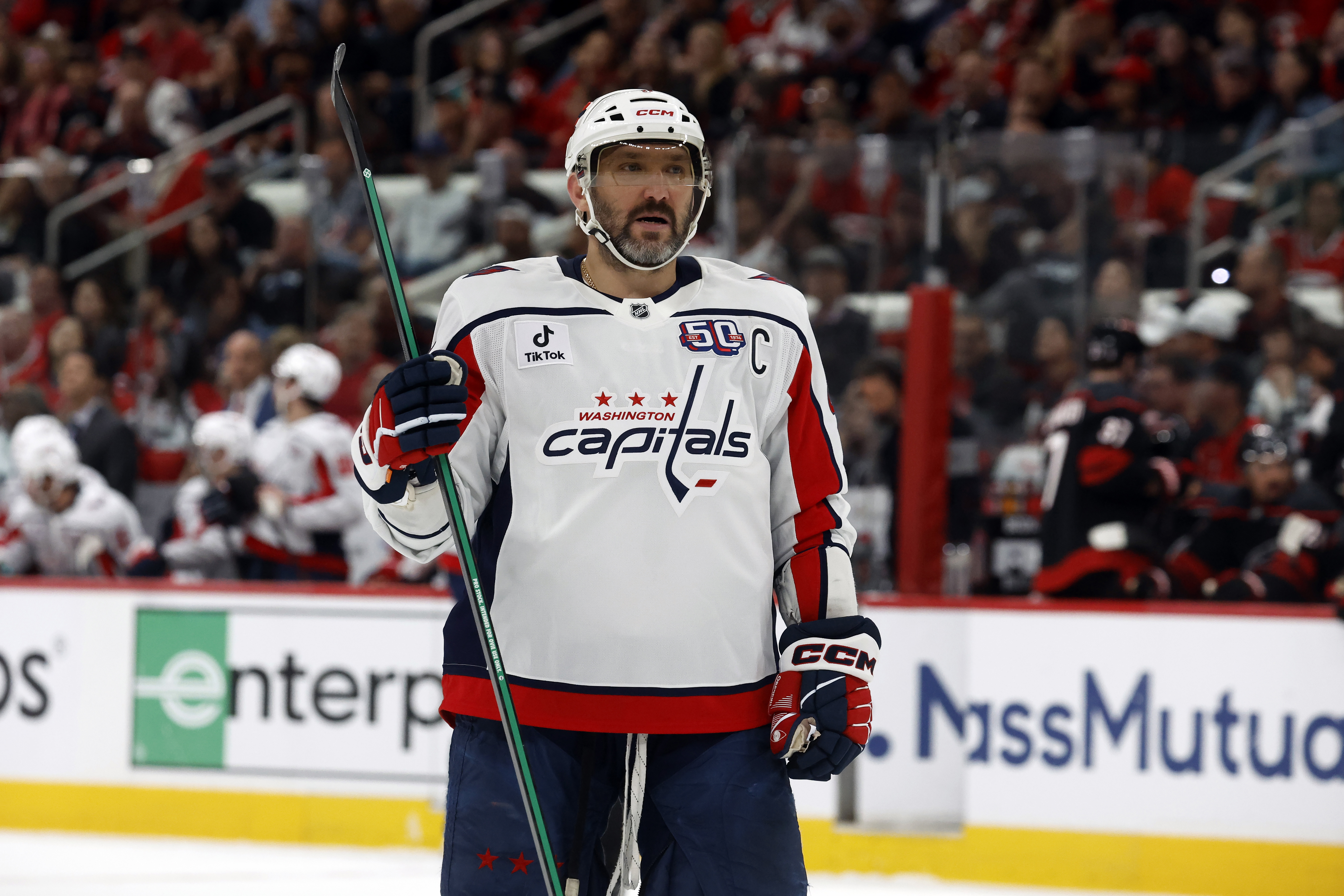 FILE - Washington Capitals' Alex Ovechkin (8) watches the puck against the Carolina Hurricanes during the first period of Game 3 of an NHL hockey Semi-final round playoff series in Raleigh, N.C., May 10, 2025.