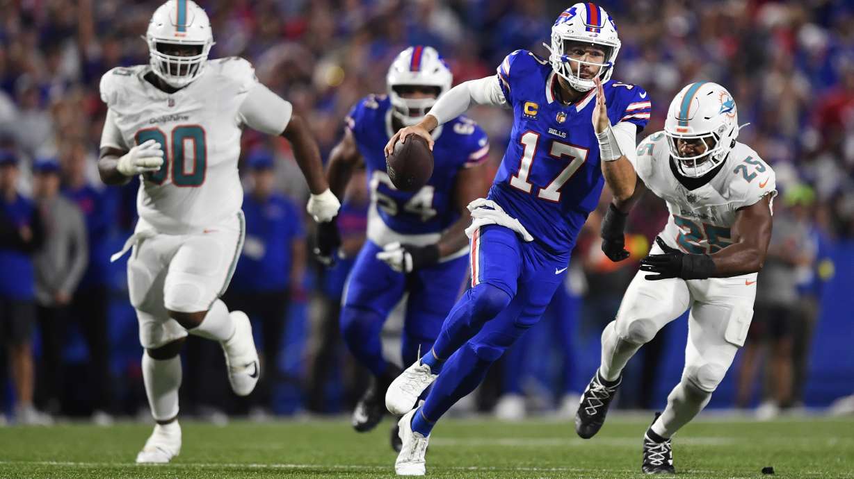Buffalo Bills quarterback Josh Allen (17) runs what the ball during the second half of an NFL football game against the Miami Dolphins, Thursday, Sept. 18, 2025, in Orchard Park, N.Y.