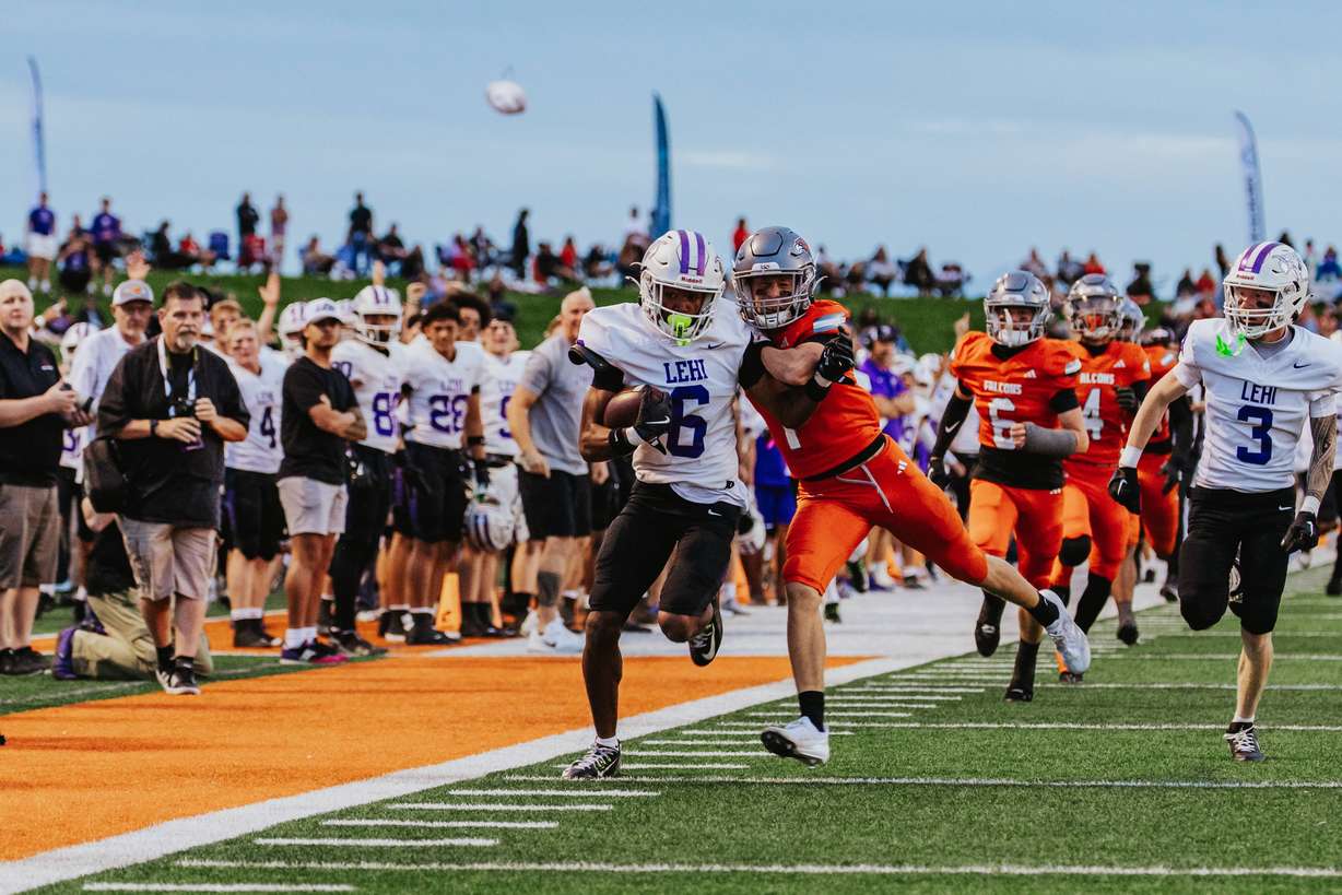 Lehi's Legend Glasker runs for a 45-yard touchdown during a high school football game at Skyridge High in Lehi, Utah, Thursday, Sept. 18, 2025.