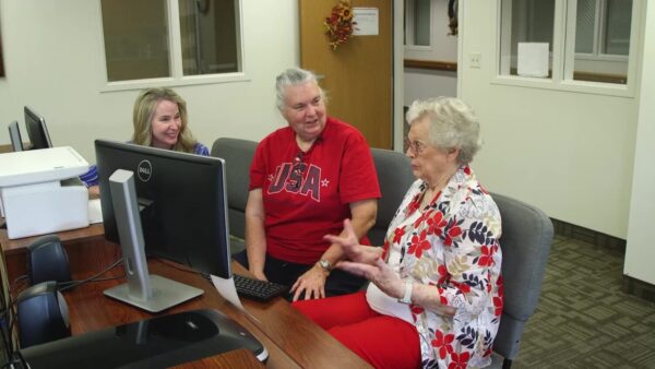 Compassionate tech helper in Riverdale honored as Volunteer of the Year by AARP