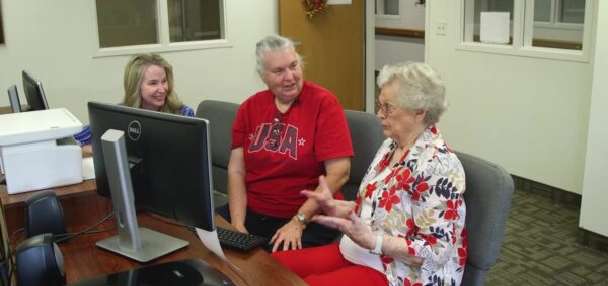 Compassionate tech helper in Riverdale honored as Volunteer of the Year by AARP