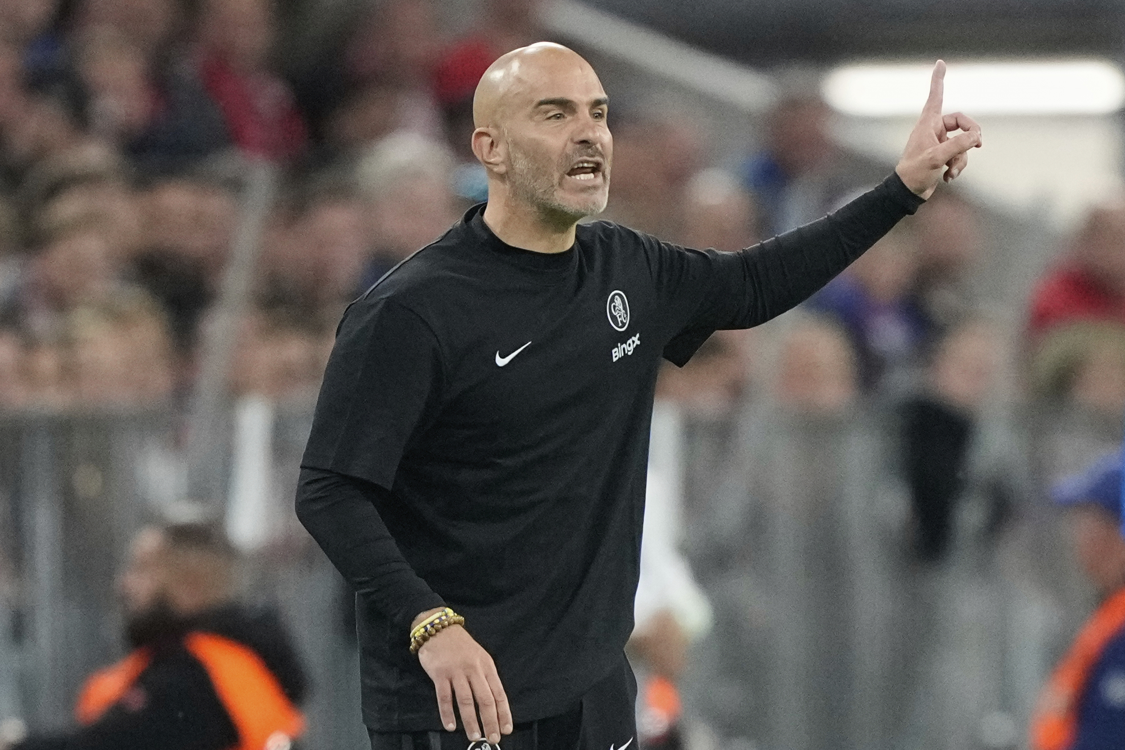 Chelsea's head coach Enzo Maresca gives instructions from the side line during the Champions League opening phase soccer match between FC Bayern Munich and Chelsea at the Allianz Arena in Munich, Germany, Wednesday, Sept. 17, 2025. 
