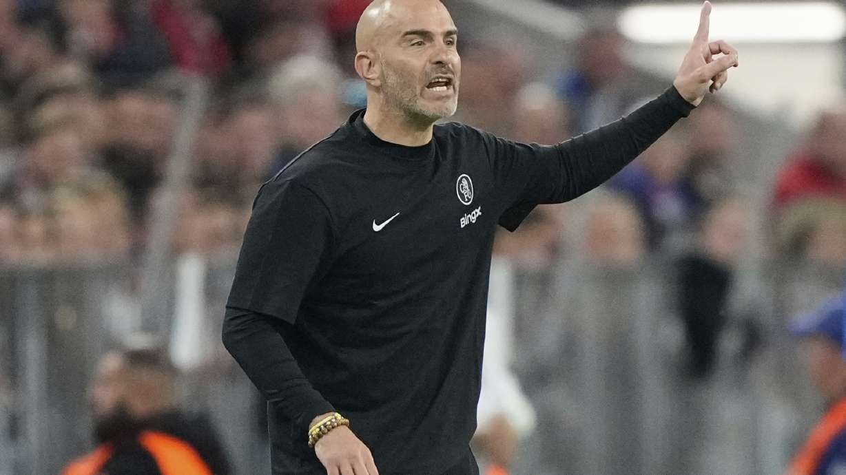 Chelsea's head coach Enzo Maresca gives instructions from the side line during the Champions League opening phase soccer match between FC Bayern Munich and Chelsea at the Allianz Arena in Munich, Germany, Wednesday, Sept. 17, 2025.