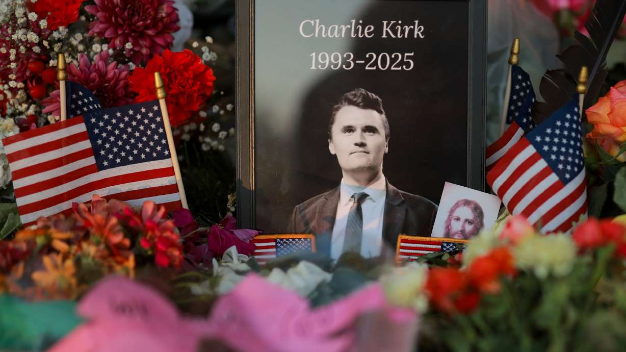 A photo of Charlie Kirk sits in a memorial at Utah Valley University in Orem on Sunday. The House on Friday passed a bipartisan resolution condemning Kirk's death and honoring "his life and legacy."