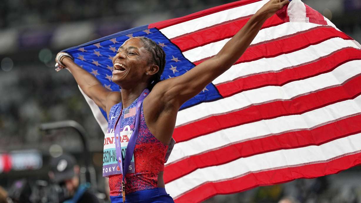 United States' Melissa Jefferson-Wooden celebrates as she wins the gold medal in the women's 200 meters final at the World Athletics Championships in Tokyo, Friday, Sept. 19, 2025.