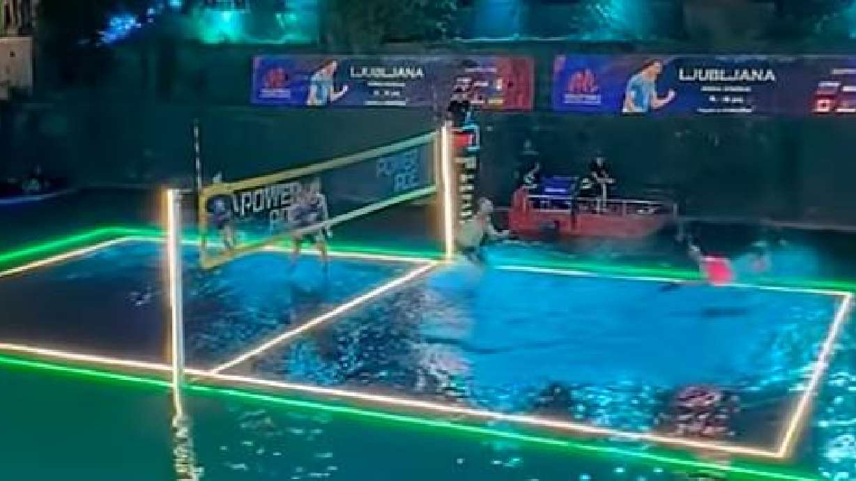 A volleyball tournament is played on a slightly submerged platform in Ljubljana, Slovenia, on July 4.