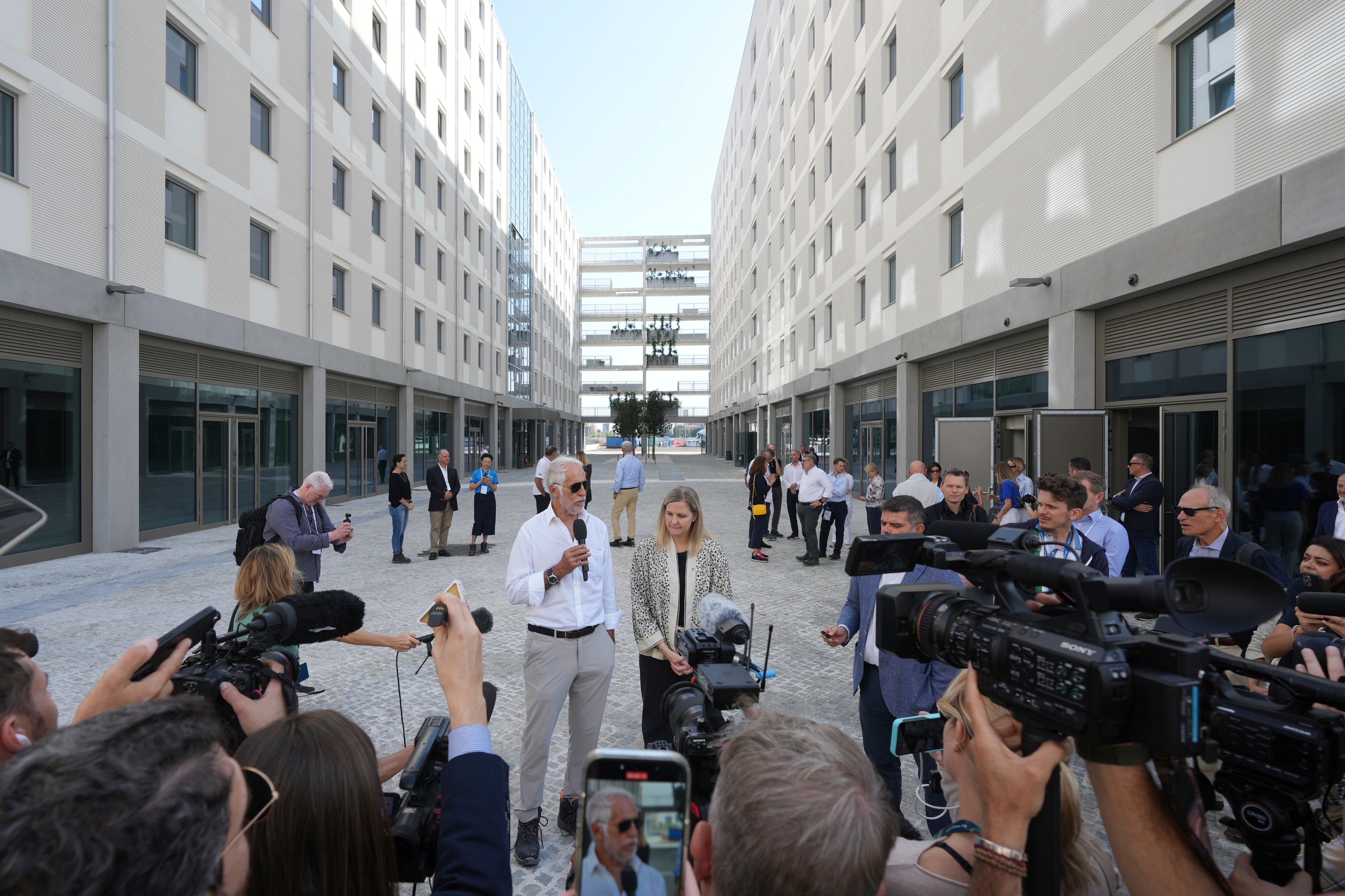 IOC President Kirsty Coventry, right, and Milano Cortina 2026 Foundation President Giovanni Malagò speak to the media during a visit to the Olympic and Paralympic Village in Milan, Italy, Thursday.