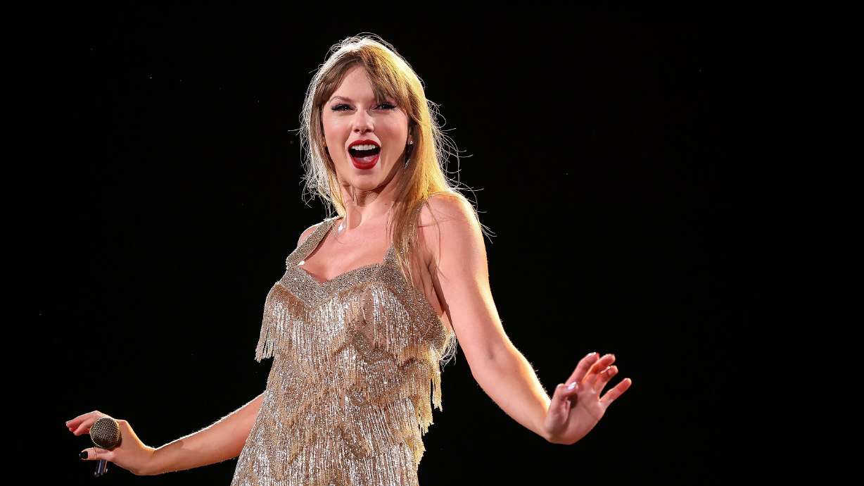 Taylor Swift performs during the The Eras Tour on Aug. 24, 2023, in Mexico City, Mexico. Swift announced her return to theaters on Friday with "The Official Release Party of a Showgirl," coinciding with the release of her new album, on Oct. 3.