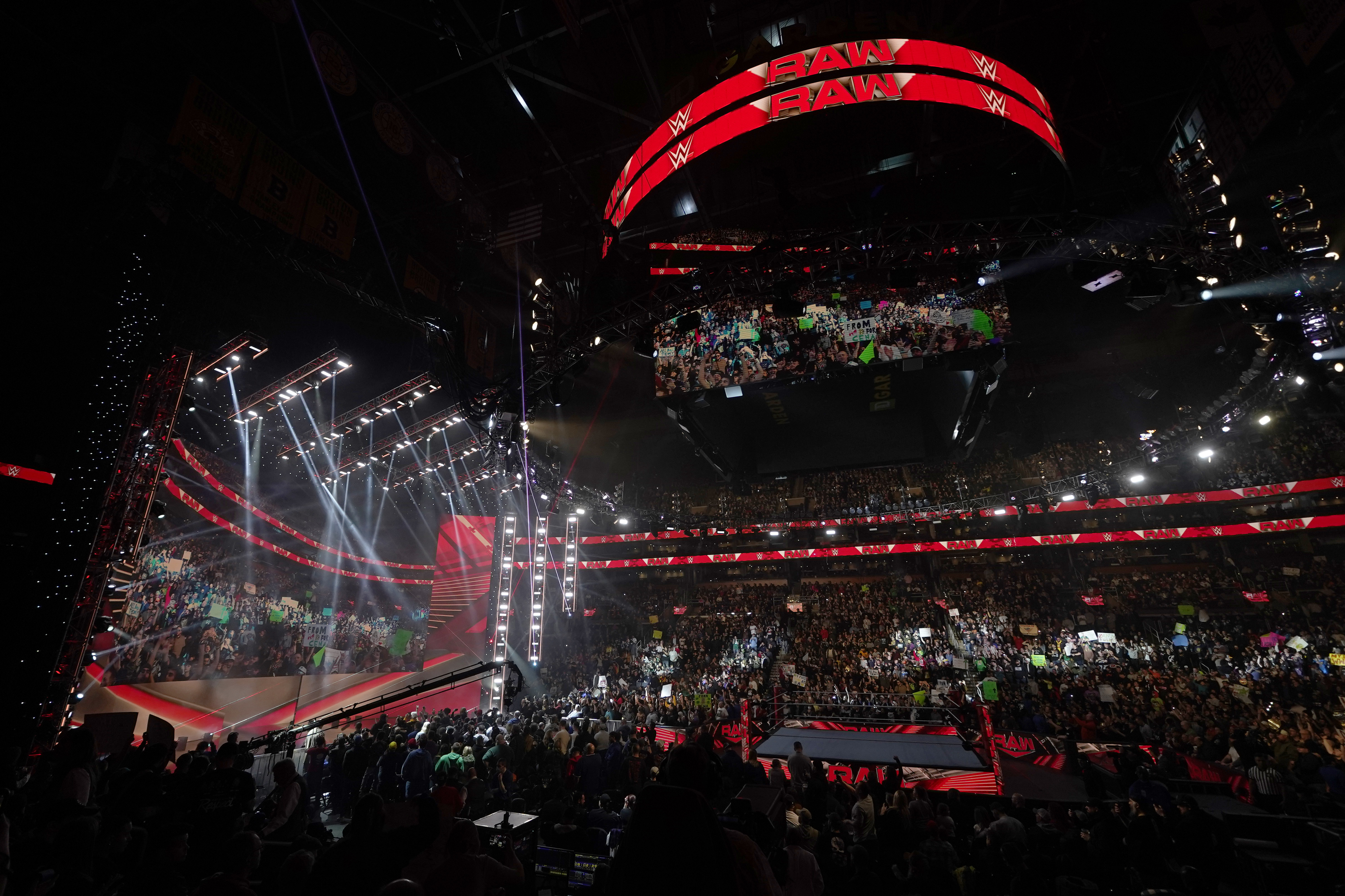 Bright lights illuminate the ring during the WWE Monday Night RAW event, Monday, March 6, 2023, in Boston.