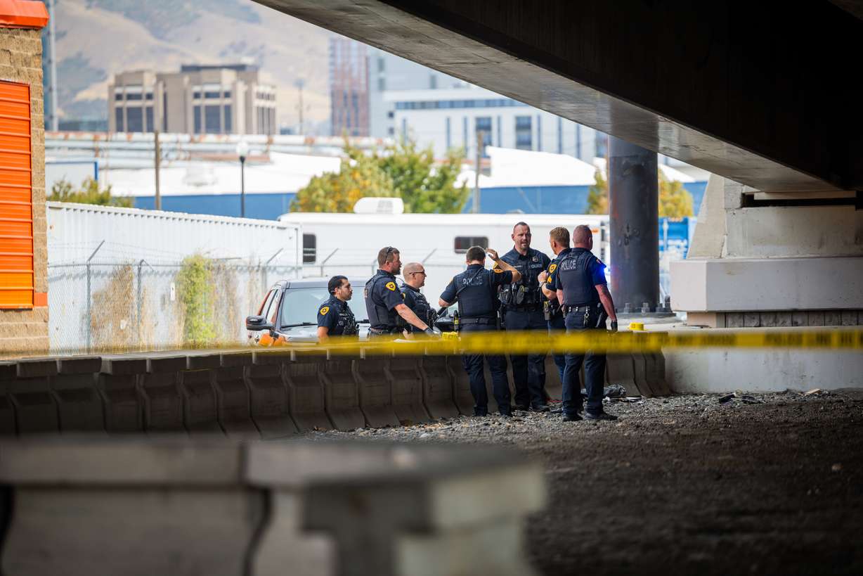 Salt Lake police officers work the scene after an officer was attacked by a trespasser in an underpass at 550 W. 500 South in Salt Lake City on Sept. 19. A state audit published on Tuesday outlined reasons that led to low morale within the police department over the past few years.