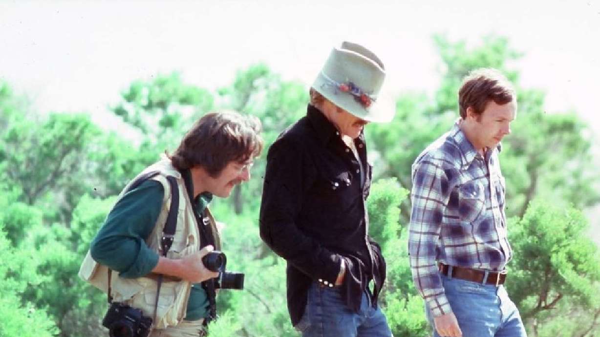 Robert Redford, Cary Jones, and a photographer walk along the Snake River in this undated photo. Jones, from Blackfoot, Idaho, reflected on his opportunity to meet with Redford, who died on Tuesday.