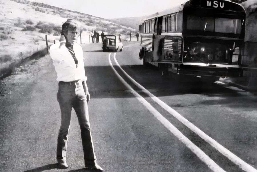 Robert Redford paces outside his bus that caught on fire in 1982 while on an archeological field trip in Washington state with graduate students. The bus fire drew national media attention.