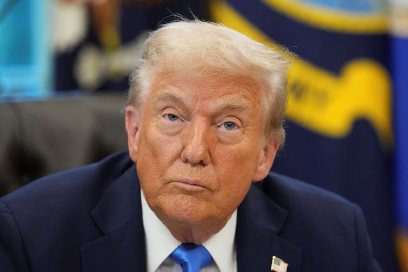 President Donald Trump in the Oval Office in Washington, Friday, when he announced a $100,000 one-time fee for H-1B visas for companies.