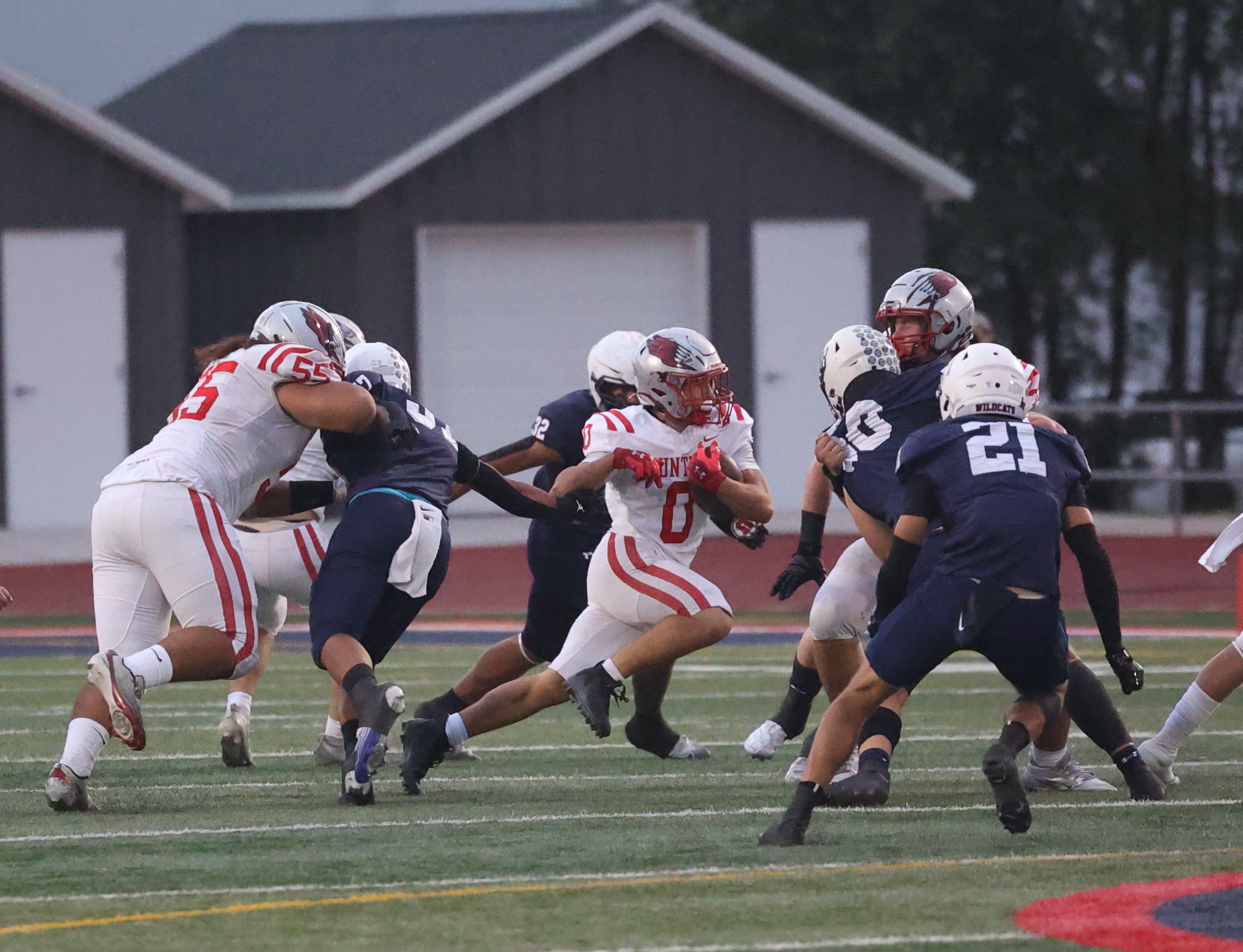 Woods Cross scratches out 28-14 win over rival Bountiful