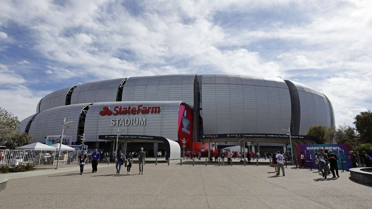 FILE - The exterior of State Farm Stadium is seen before the NFL Super Bowl 57 football game in Glendale, Ariz., on Sunday, Feb. 12, 2023.