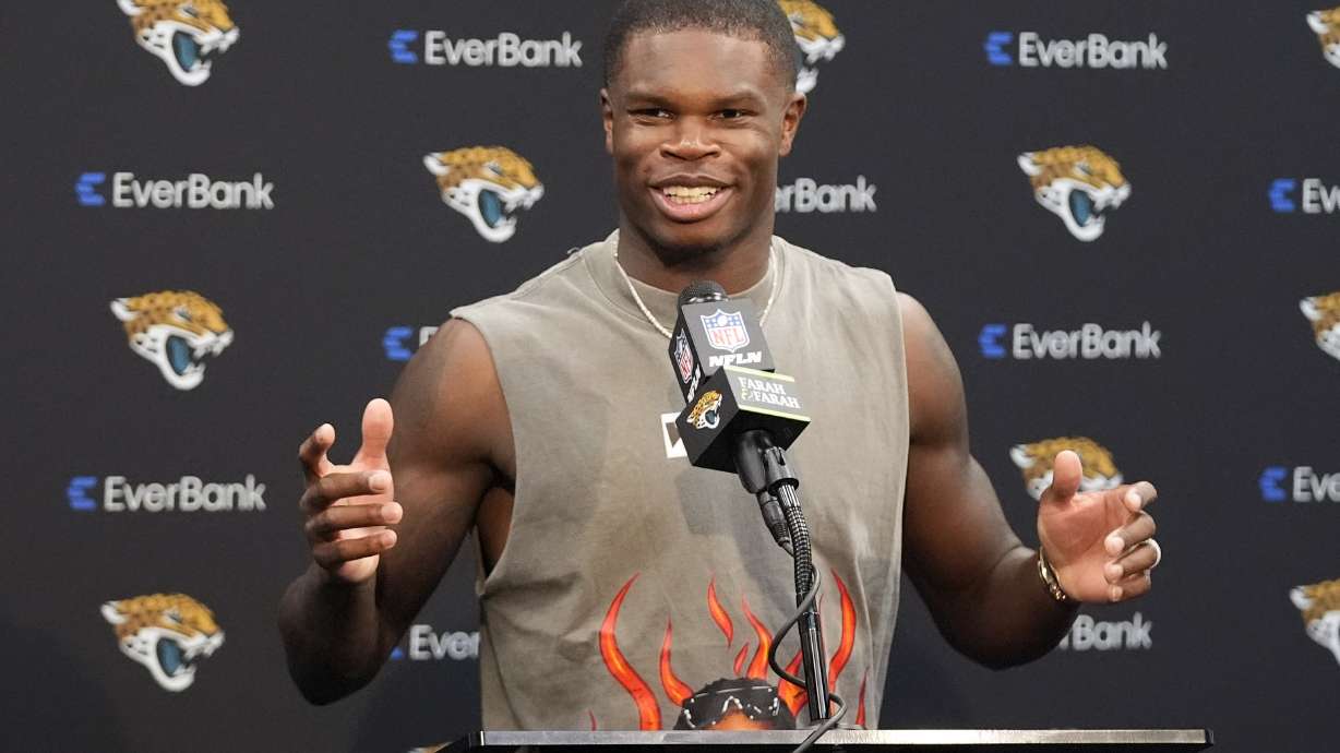 Jacksonville Jaguars wide receiver Travis Hunter speaks at a news conference after an NFL football game against the Carolina Panthers, Sunday, Sept. 7, 2025, in Jacksonville, Fla.