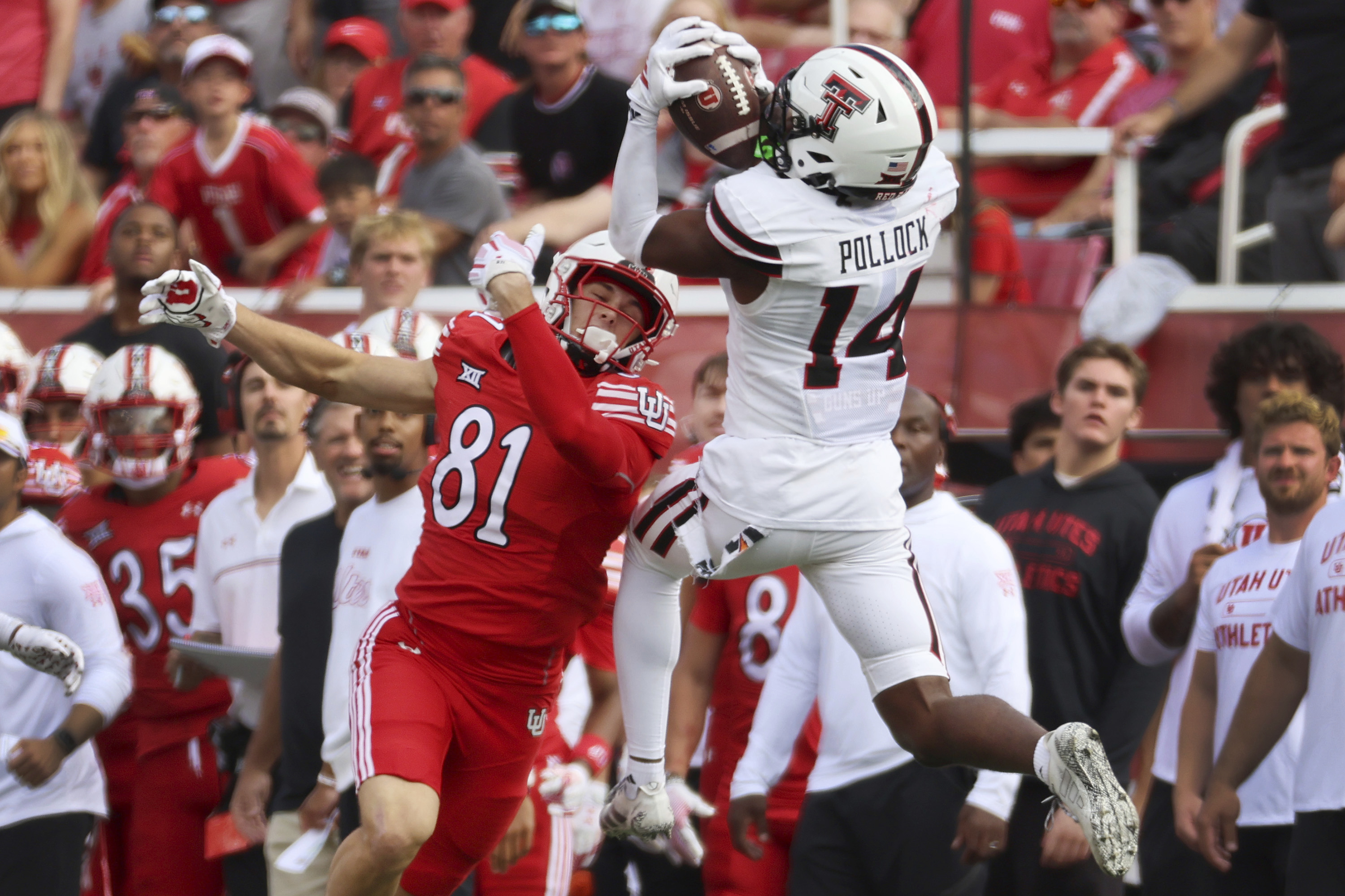 Texas Tech defensive back Brice Pollock intercepts a pass intended for Utah tight end JJ Buchanan during the first half of an NCAA college football game Saturday, Sept. 20, 2025, in Salt Lake City, Utah. 
