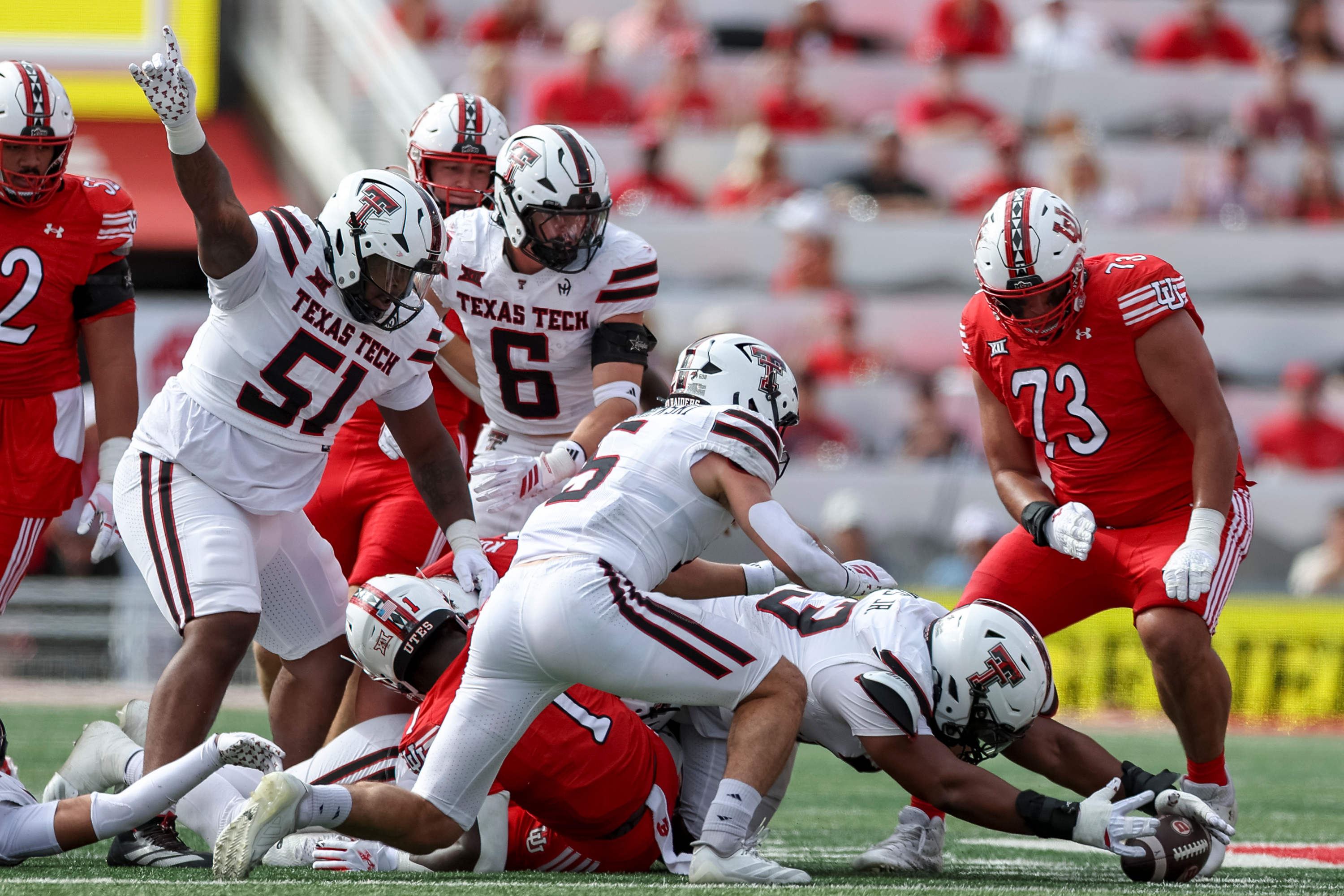 Texas Tech Red Raiders defensive lineman Dylan Singleton (93) jumps on a loose ball during the first half of the game against the Utah Utes at Rice-Eccles Stadium in Salt Lake City on Saturday, Sept. 20, 2025.