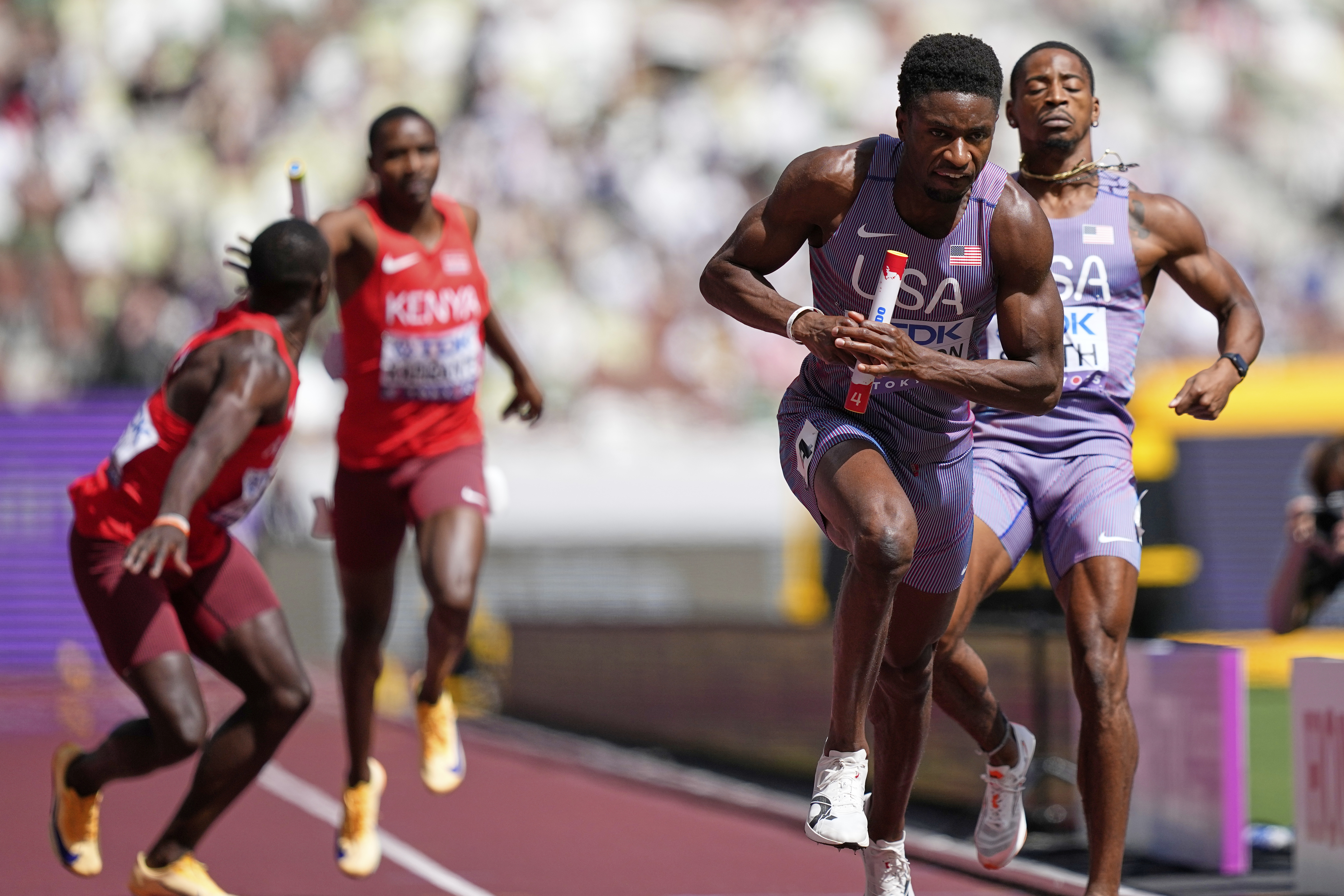 United States' Bryce Deadmon starts his leg in a run-off heat against Kenya in the men's 4x400 meters relay at the World Athletics Championships in Tokyo, Sunday, Sept. 21, 2025. 