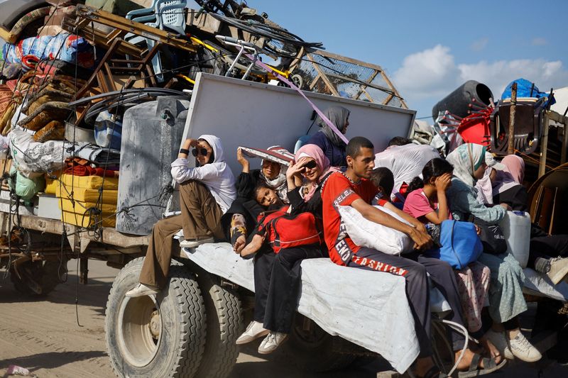 Displaced Palestinians, fleeing northern Gaza due to an Israeli military operation, move south, after Israeli forces ordered residents of Gaza City to evacuate to the south Sunday.