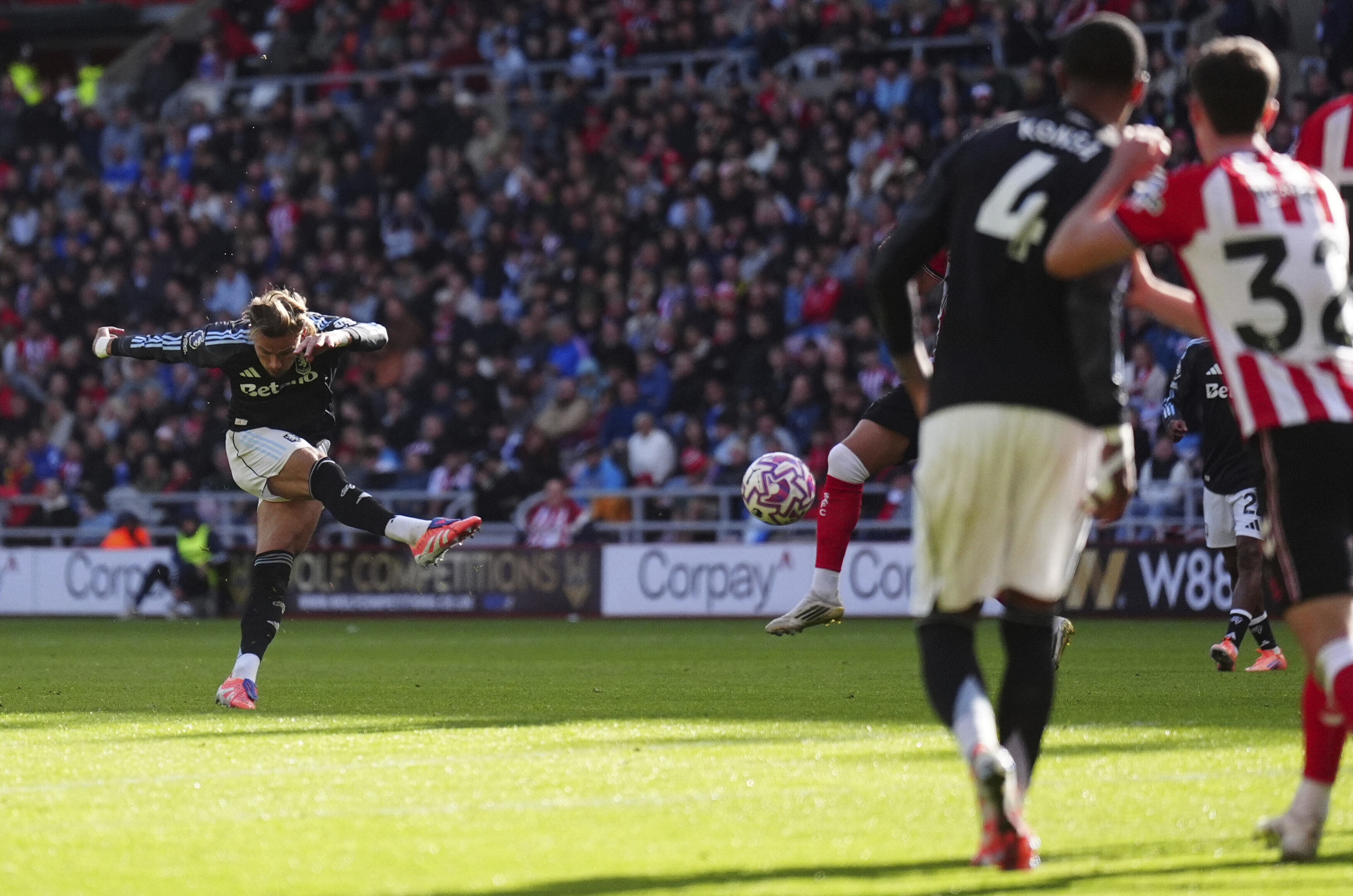 Aston Villa's Matty Cash scores his side's first goal of the game during the English Premier League soccer match between Sunderland and Aston Villa at the Stadium of Light, in Sunderland, England, Sunday Sept. 21, 2025. 