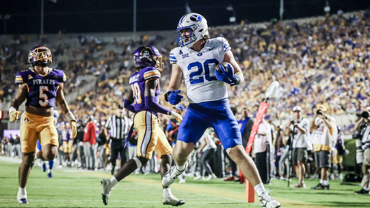 BYU tight end Carsen Ryan (20) celebrates a touchdown during an NCAA college football game against East Carolina, Saturday, Sept. 20, 2025 in Greenville, N.C.