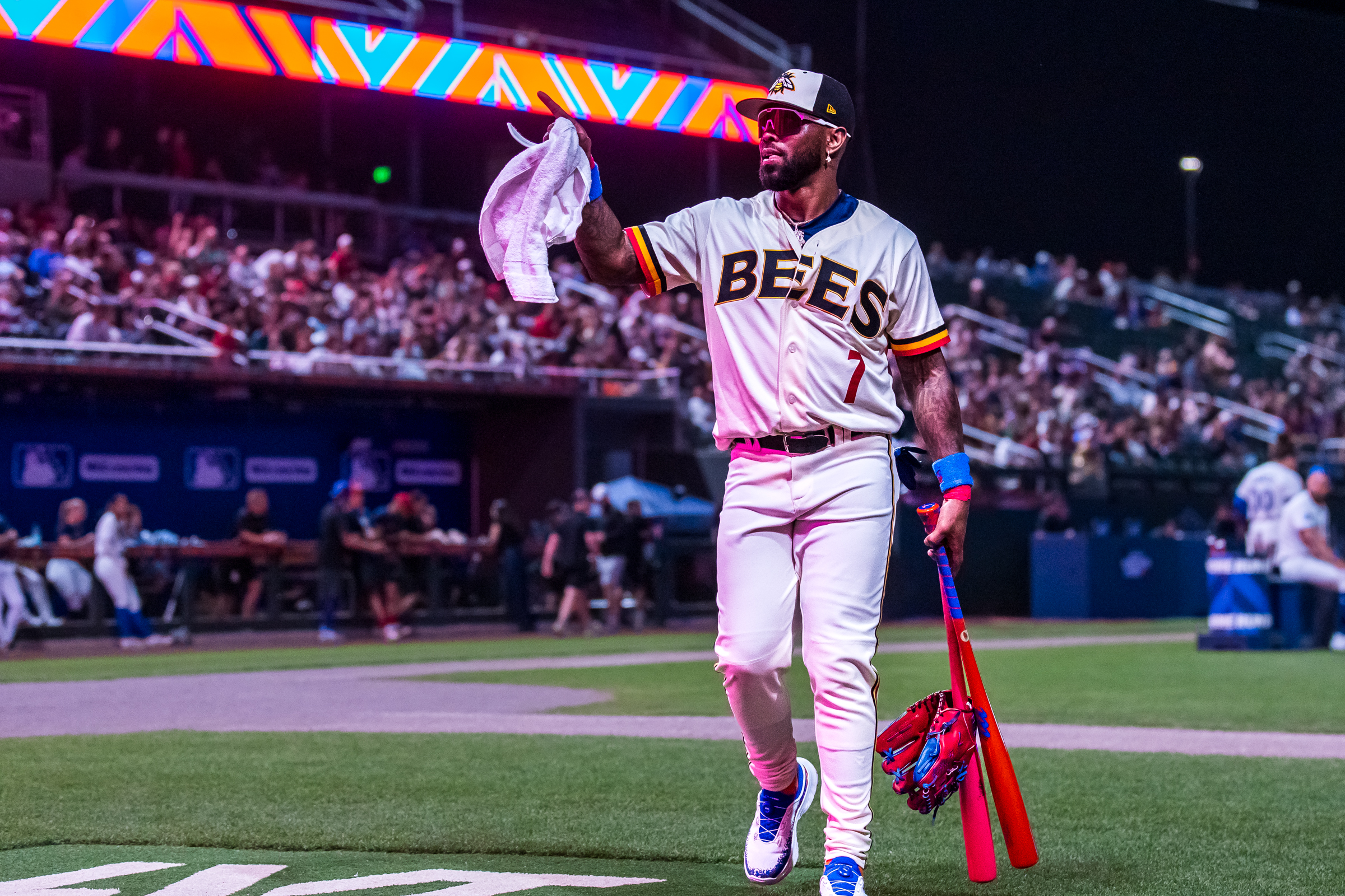 Four-time MLB All-Star Jose Reyes points to a fan after helping the Salt Lake Bees advance to the semifinals during Home Run Derby X at The Ballpark at America First Square in South Jordan on Friday.