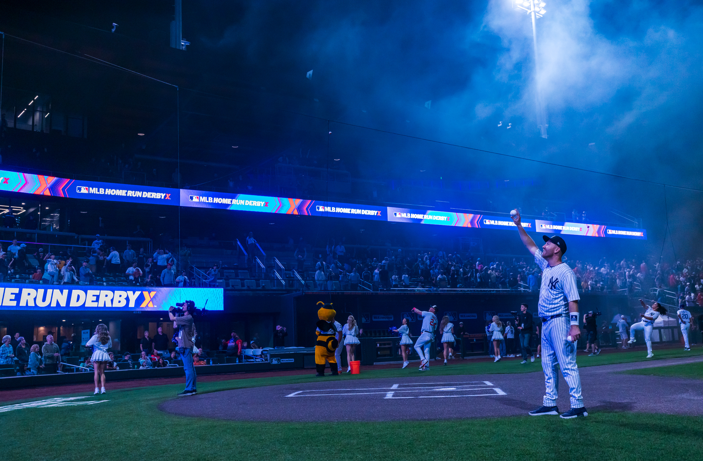 Two-time MLB All-Star Todd Frazier tosses baseballs into the stands at the end of Home Run Derby X at The Ballpark at America First Square in South Jordan on Saturday.