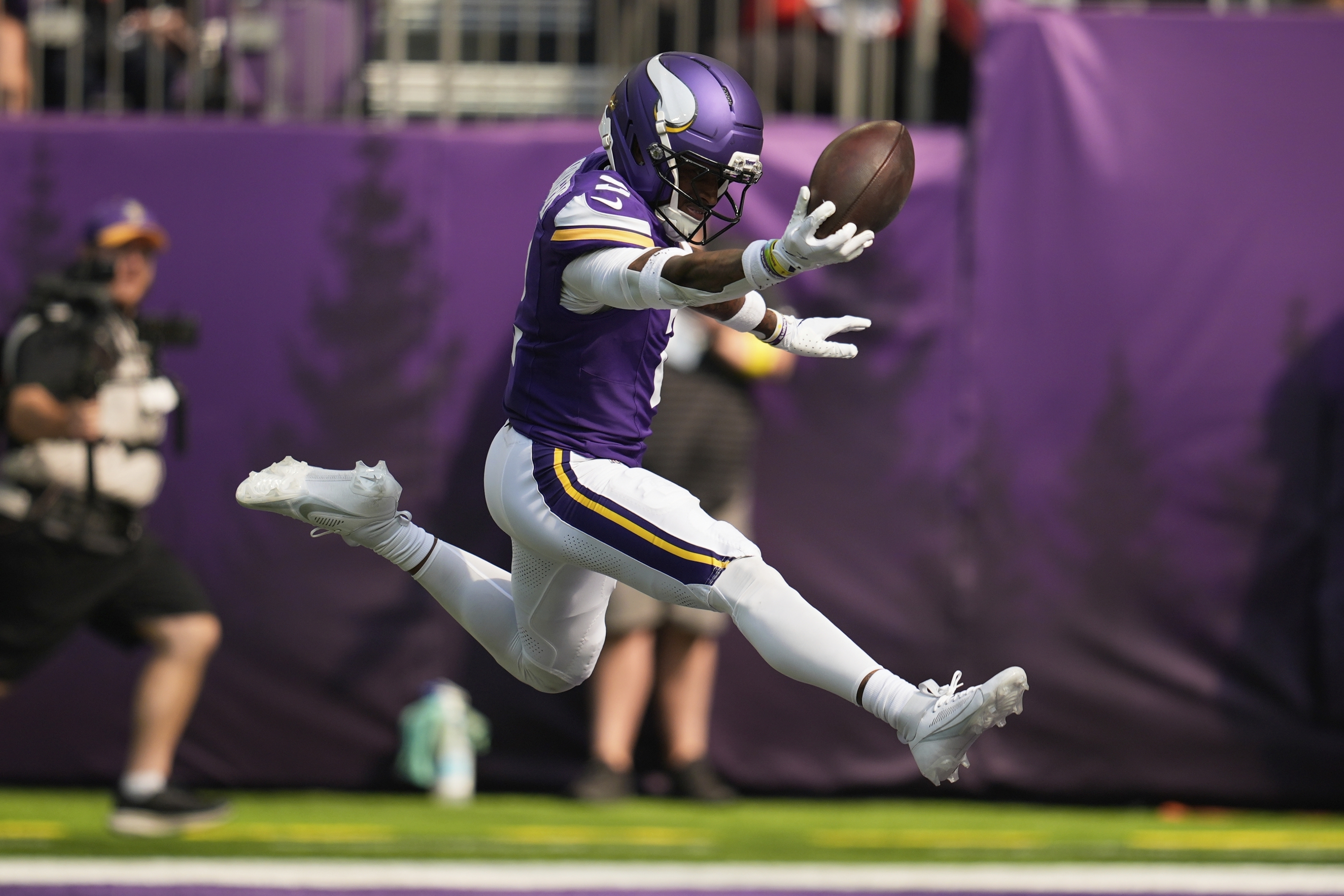 Minnesota Vikings cornerback Isaiah Rodgers celebrates as he recovered a fumble for a touchdown during the first half of an NFL football game against the Cincinnati Bengals, Sunday, Sept. 21, 2025, in Minneapolis. 