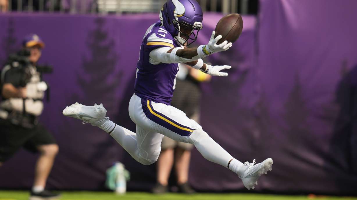 Minnesota Vikings cornerback Isaiah Rodgers celebrates as he recovered a fumble for a touchdown during the first half of an NFL football game against the Cincinnati Bengals, Sunday, Sept. 21, 2025, in Minneapolis.